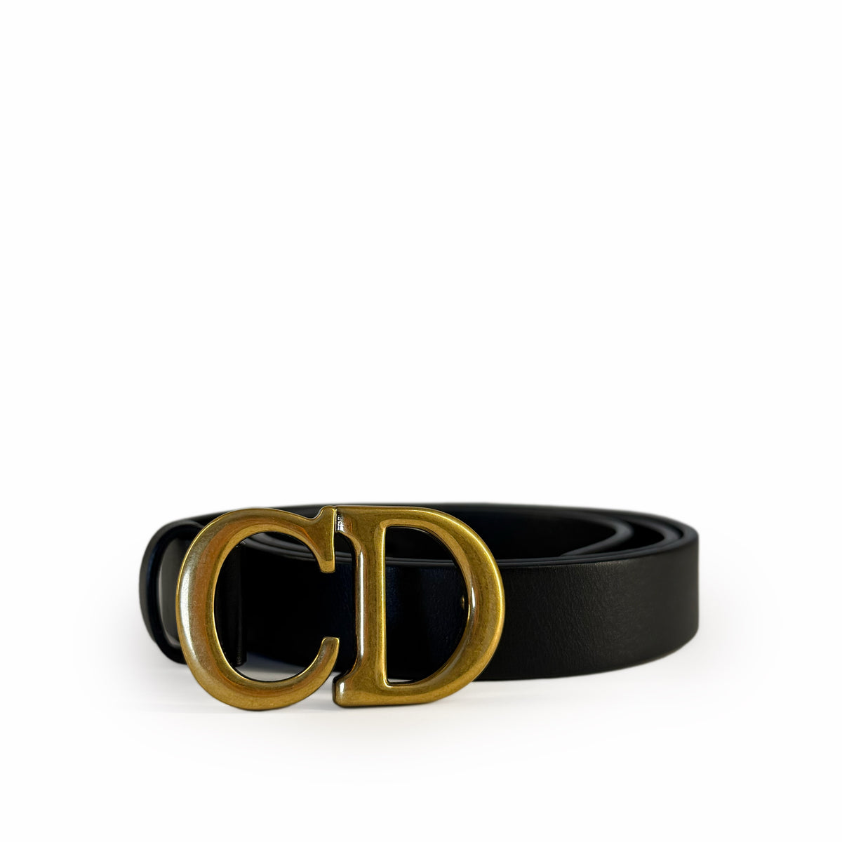 Black leather belt with gold-tone CD buckle, curated Pre-loved Luxury by Myluxe in Helsinki.