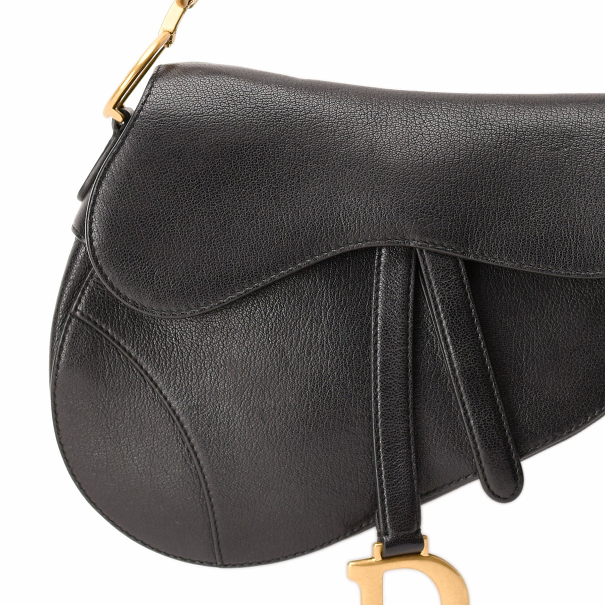 Black pebbled leather Dior saddle bag with gold hardware, curated Pre-loved Luxury by Myluxe in Helsinki.