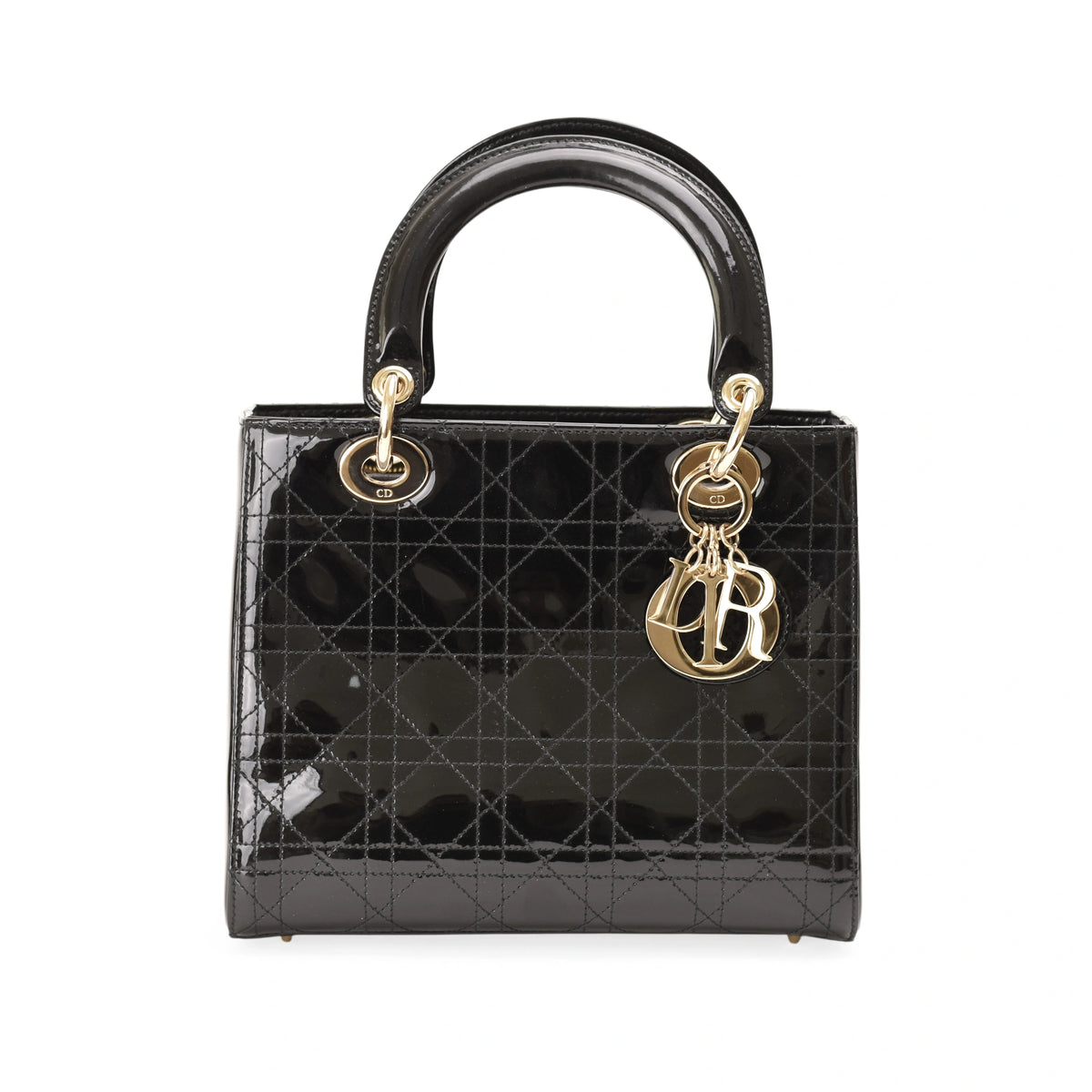 Black patent leather Dior Lady Dior handbag with gold-tone hardware. curated Pre-loved Luxury by Myluxe in Helsinki.