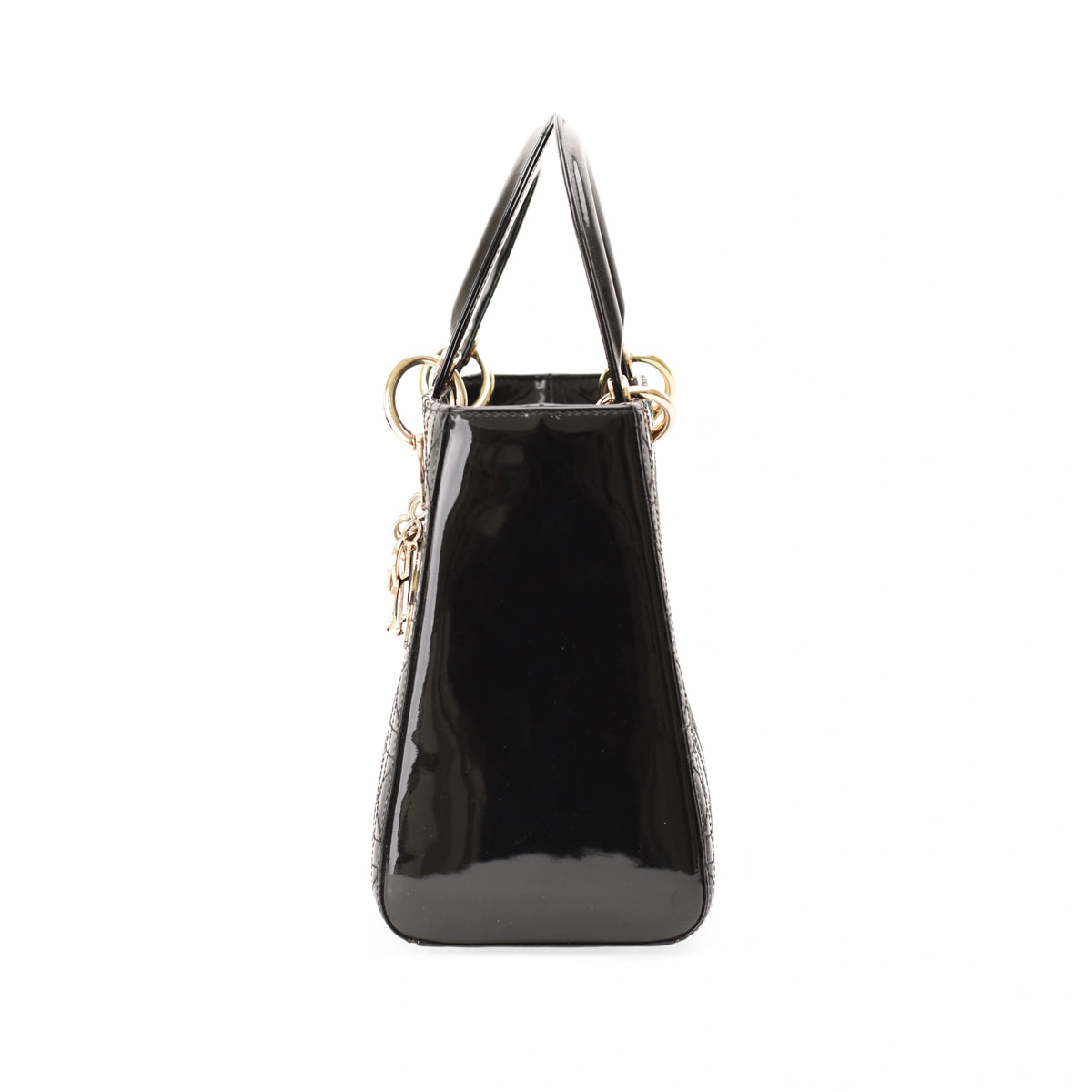 Black patent leather handbag with gold-tone hardware. Curated Pre-loved Luxury by Myluxe in Helsinki.