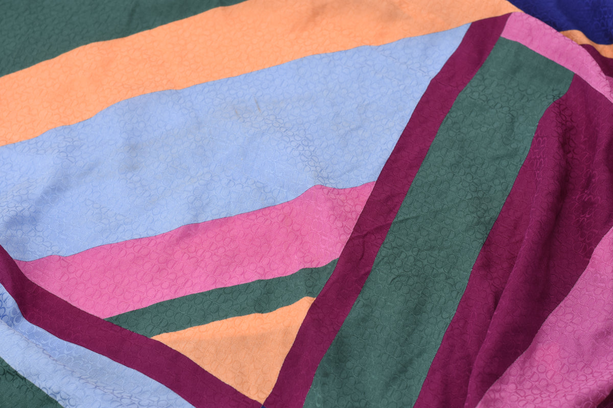 Dior multicolor CD monogram silk scarf in pink, blue, orange, and green. curated Pre-loved Luxury by Myluxe in Helsinki.