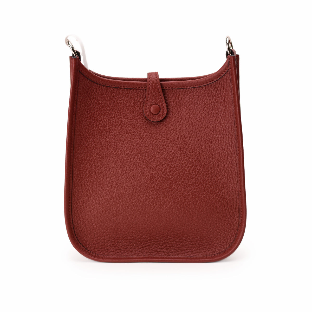 Red pebbled leather bucket bag with button closure, curated Pre-loved Luxury by Myluxe in Helsinki.