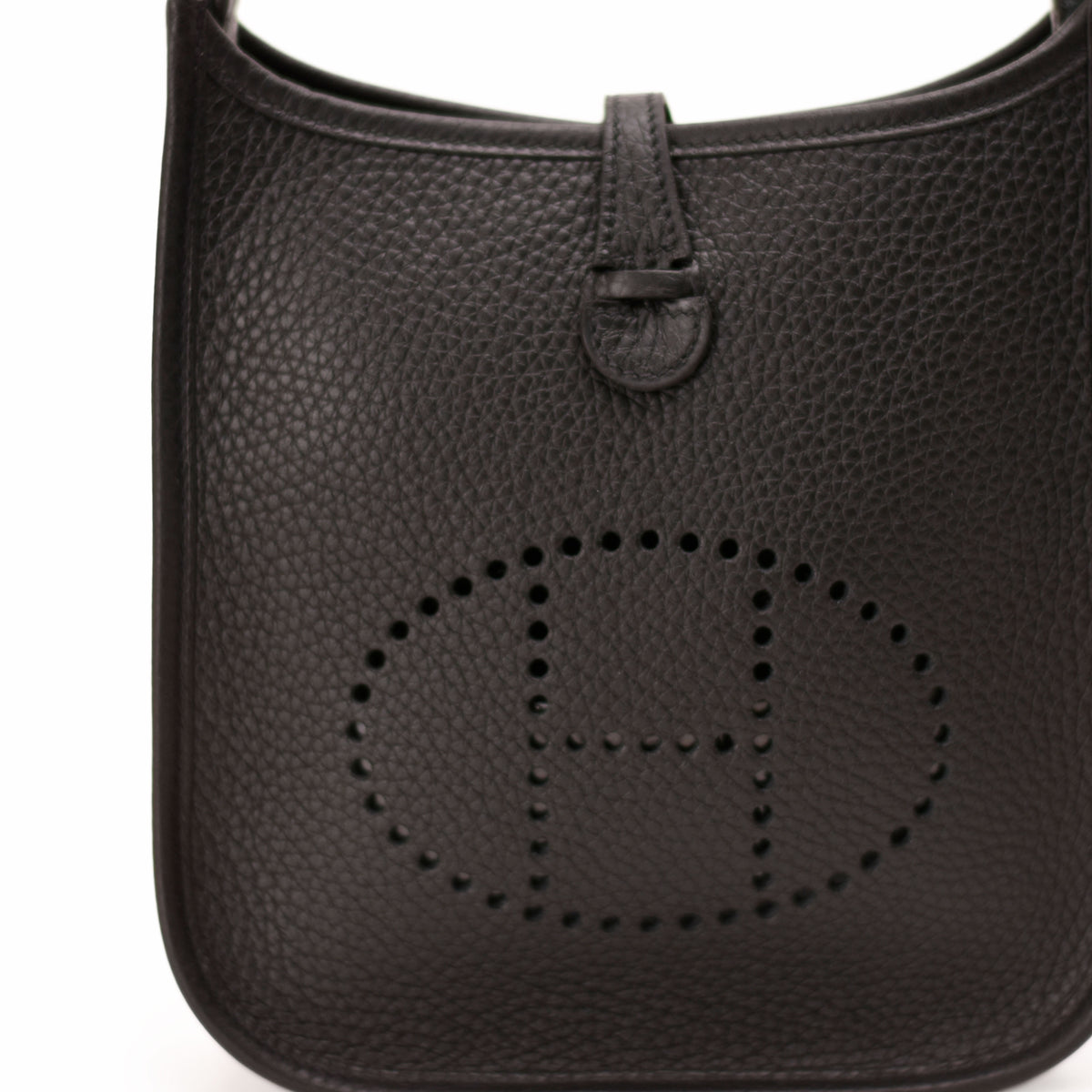 Black leather Hermès bag with perforated H logo detail. curated Pre-loved Luxury by Myluxe in Helsinki.