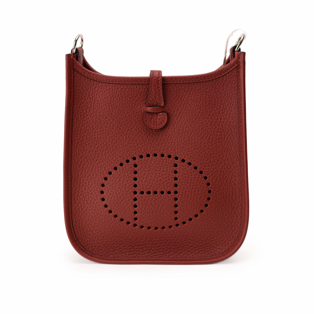 Hermès red leather bucket bag with perforated H logo. curated Pre-loved Luxury by Myluxe in Helsinki.