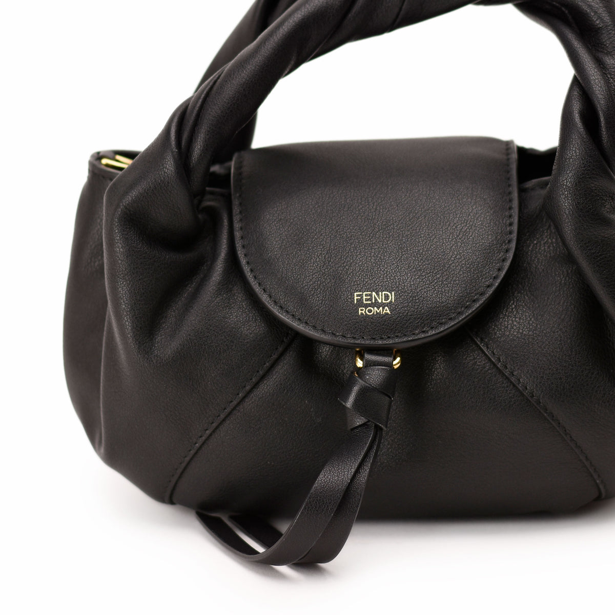Black leather Fendi Roma handbag with knotted handle and gold hardware. curated Pre-loved Luxury by Myluxe in Helsinki.