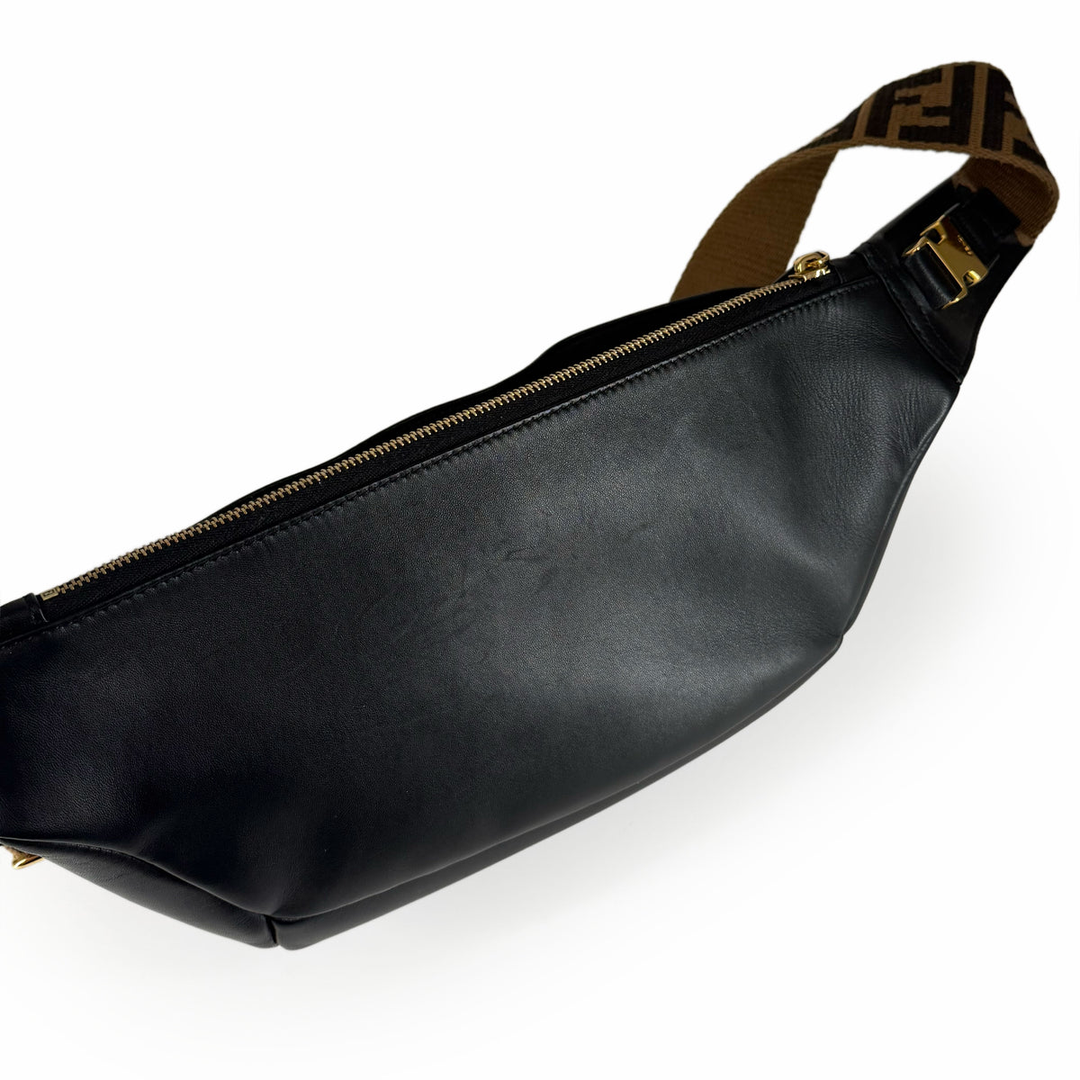 Black leather waist bag with brown monogrammed canvas strap, curated Pre-loved Luxury by Myluxe in Helsinki.