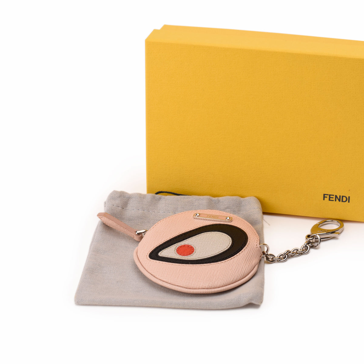 Pink Fendi leather coin purse with graphic design and silver chain. curated Pre-loved Luxury by Myluxe in Helsinki.