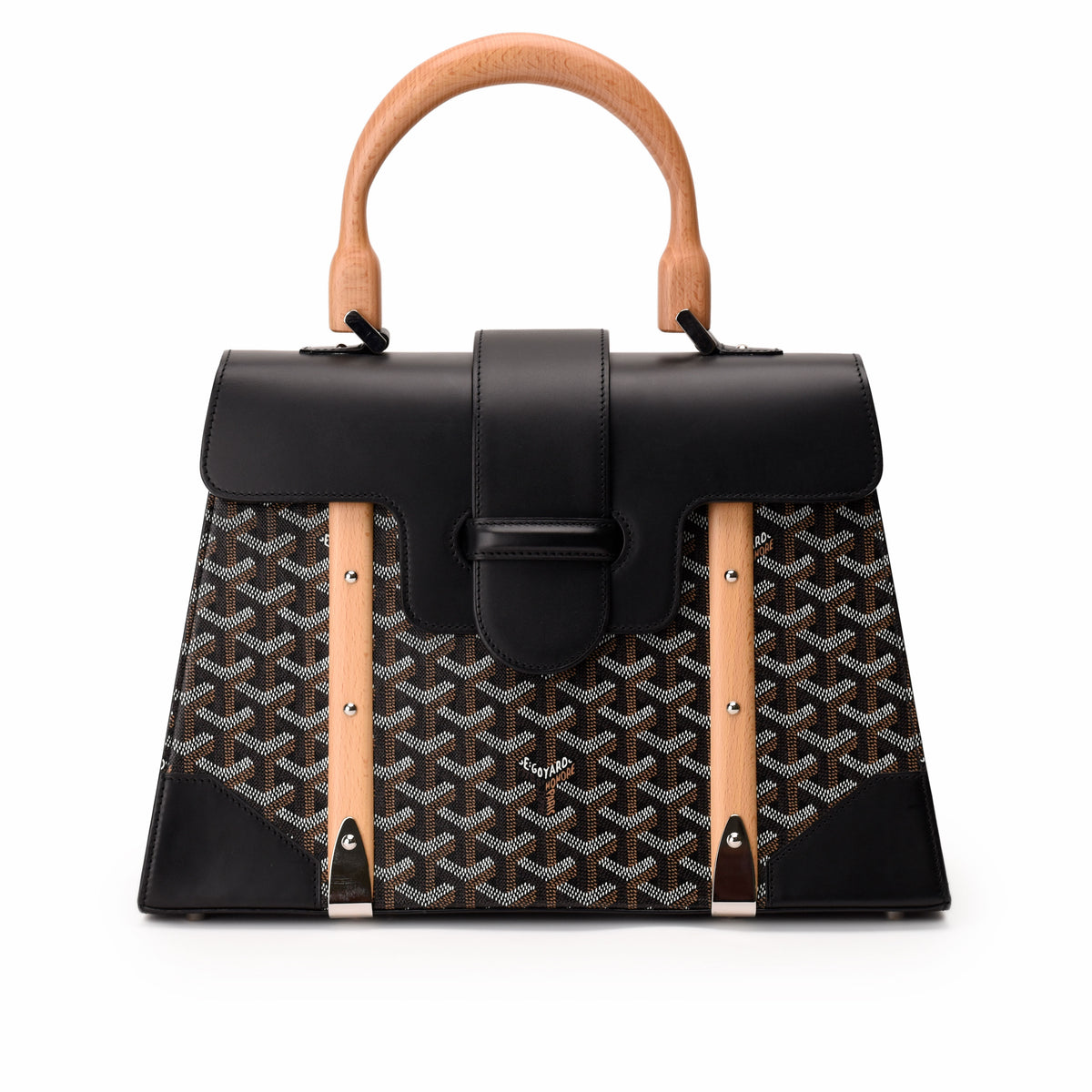 Black and patterned Goyard leather handbag with light wood handles, curated Pre-loved Luxury by Myluxe in Helsinki.