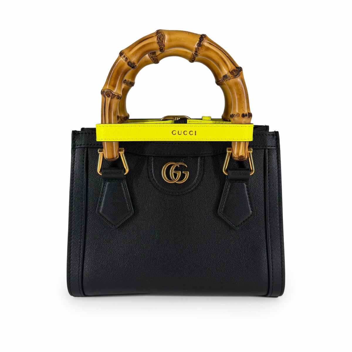 Black grained leather Gucci bamboo handle handbag with gold GG hardware, curated Pre-loved Luxury by Myluxe in Helsinki.