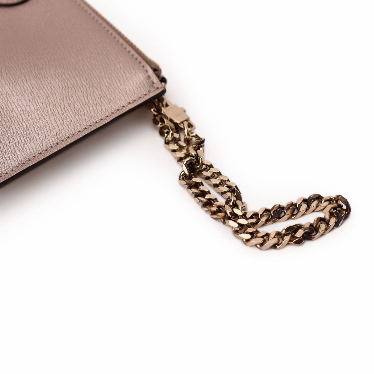 Champagne gold metal chain strap on a taupe grained leather handbag. curated Pre-loved Luxury by Myluxe in Helsinki.