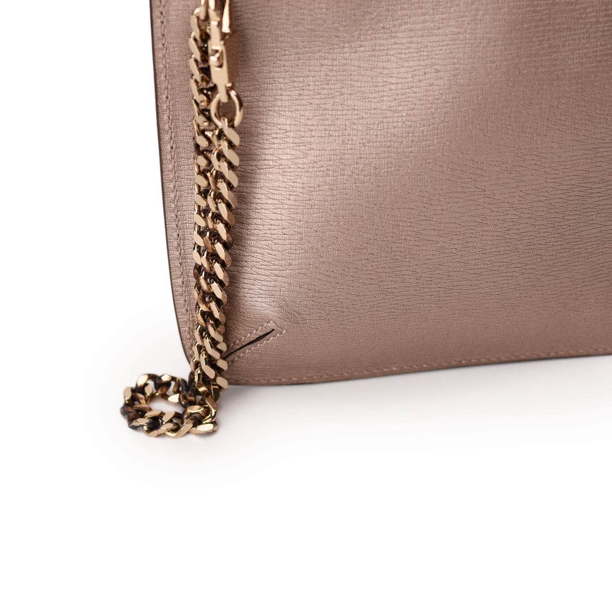 Rose gold metallic leather handbag with gold chain strap. curated Pre-loved Luxury by Myluxe in Helsinki.