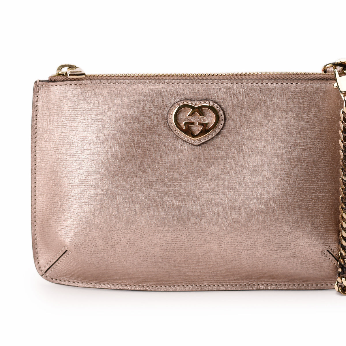 Gucci gold heart logo metallic rose gold leather crossbody bag. Curated Pre-loved Luxury by Myluxe in Helsinki.