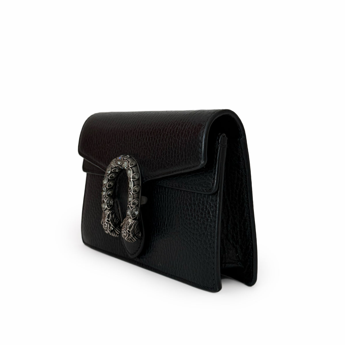 Black grained leather handbag with ornate silver buckle, curated Pre-loved Luxury by Myluxe in Helsinki.