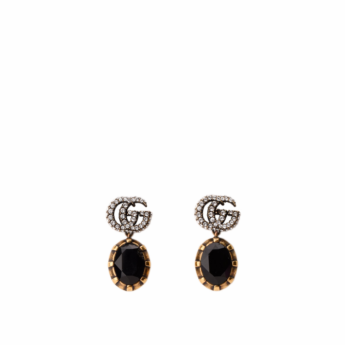 Gucci earrings with diamond-encrusted GG logo and black oval gemstones, curated Pre-loved Luxury by Myluxe in Helsinki.
