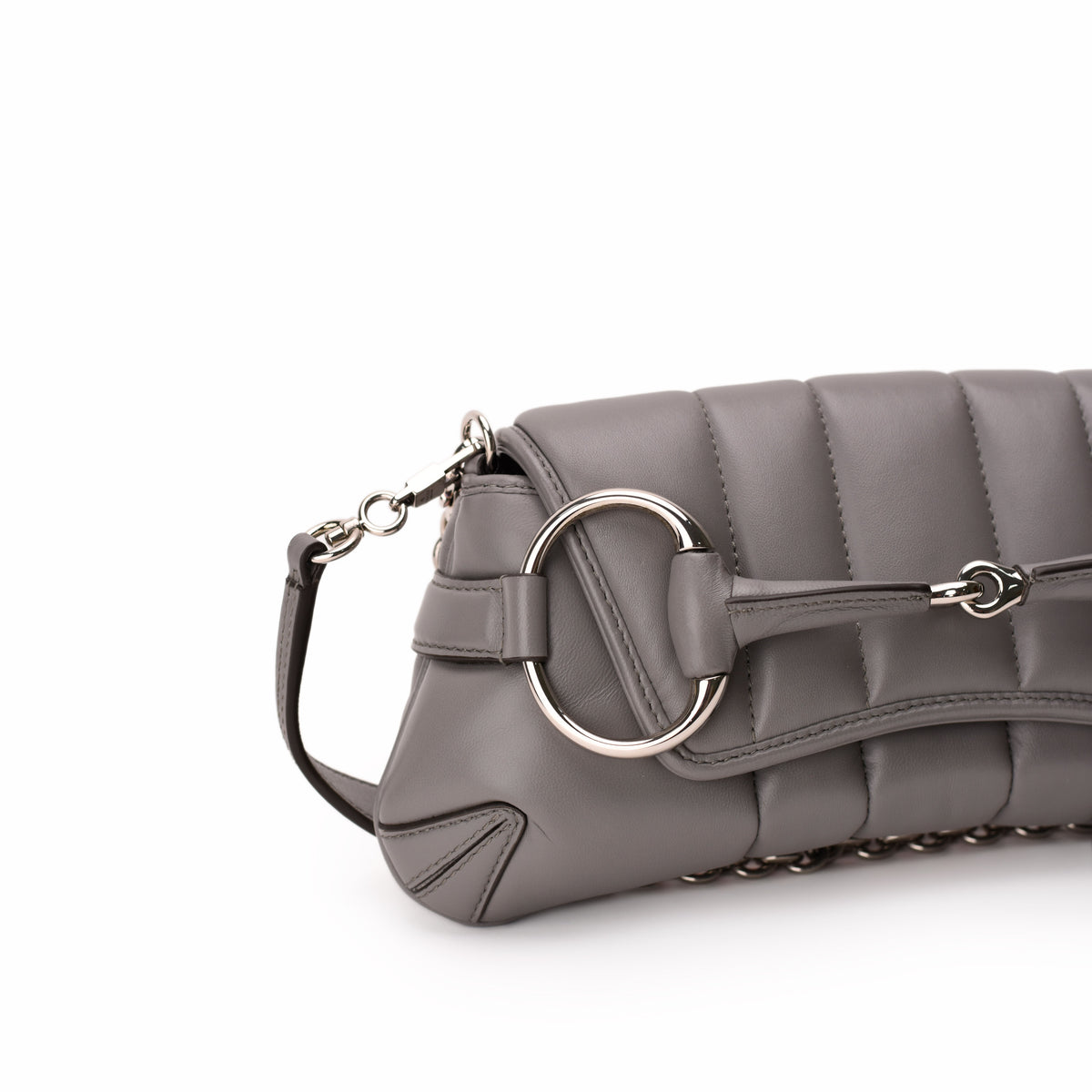 Grey quilted leather clutch with silver-tone ring hardware, curated Pre-loved Luxury by Myluxe in Helsinki.