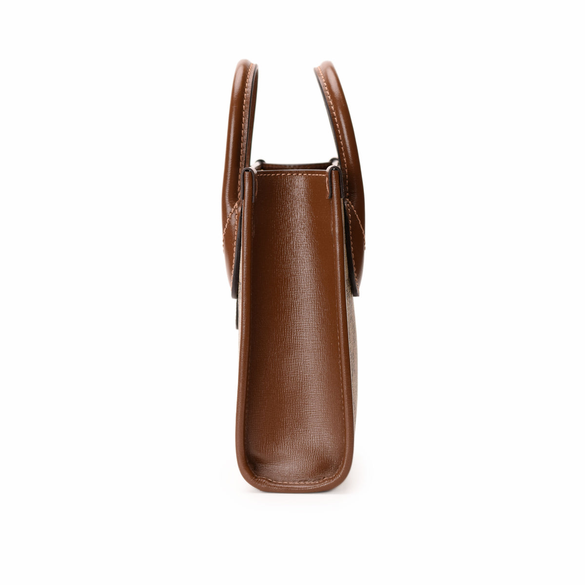 Gucci Interlocking G Mini Tote Bag in GG Supreme Canvas with leather trim and handles, stylish and compact accessory for everyday use.