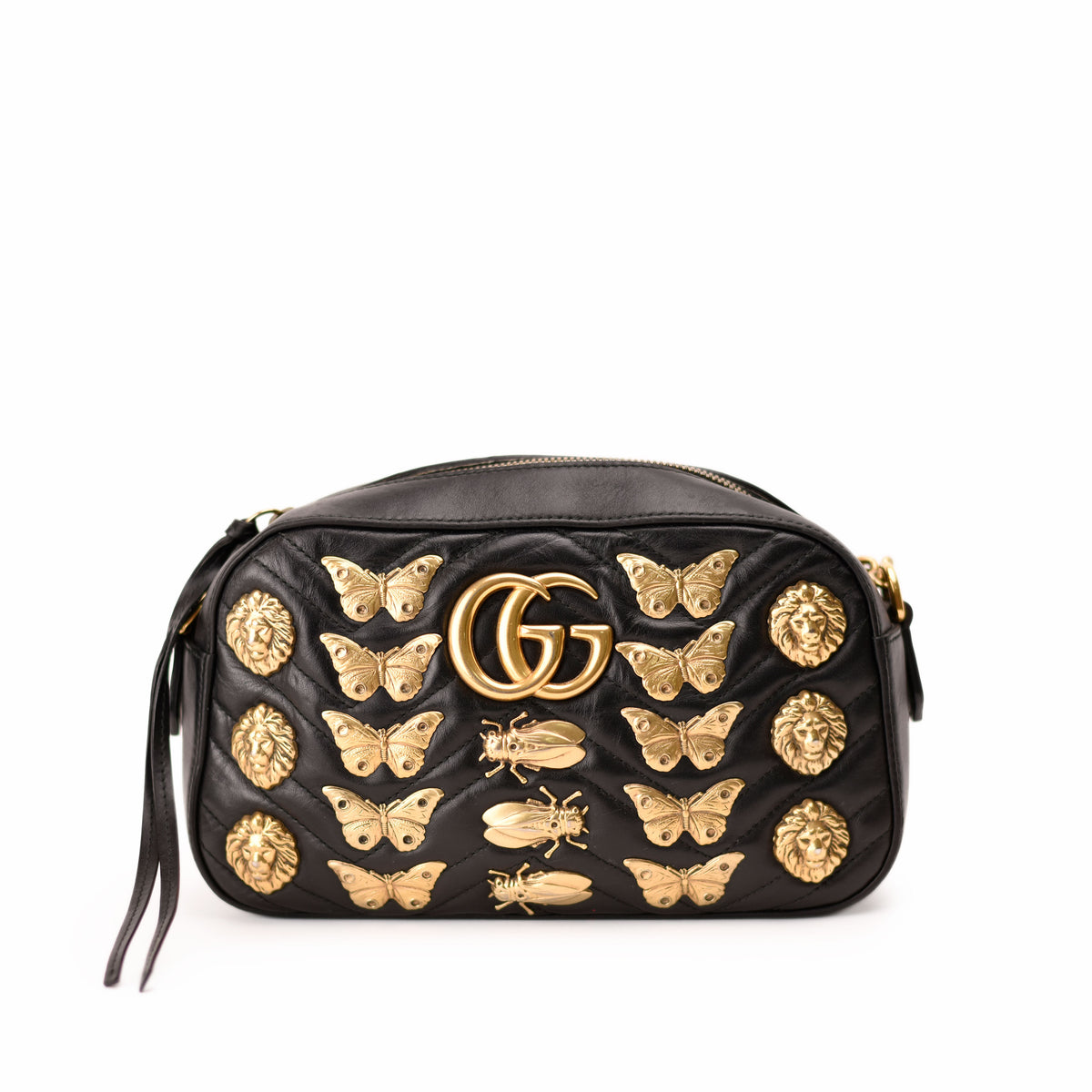 Black leather Gucci camera bag with gold butterfly and lion embellishments. curated Pre-loved Luxury by Myluxe in Helsinki.