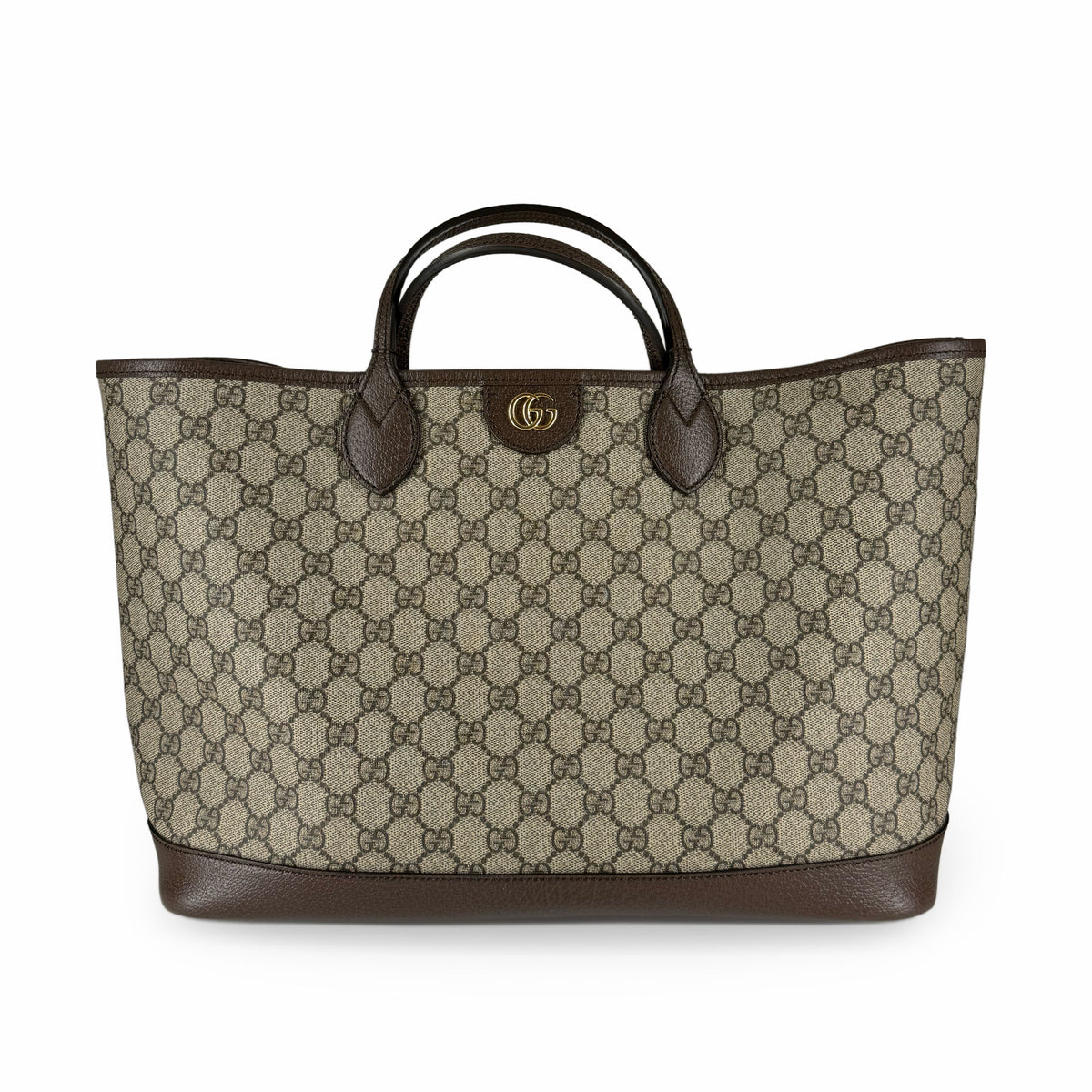 Gucci GG monogram canvas tote bag with brown leather handles and trim, curated Pre-loved Luxury by Myluxe in Helsinki.