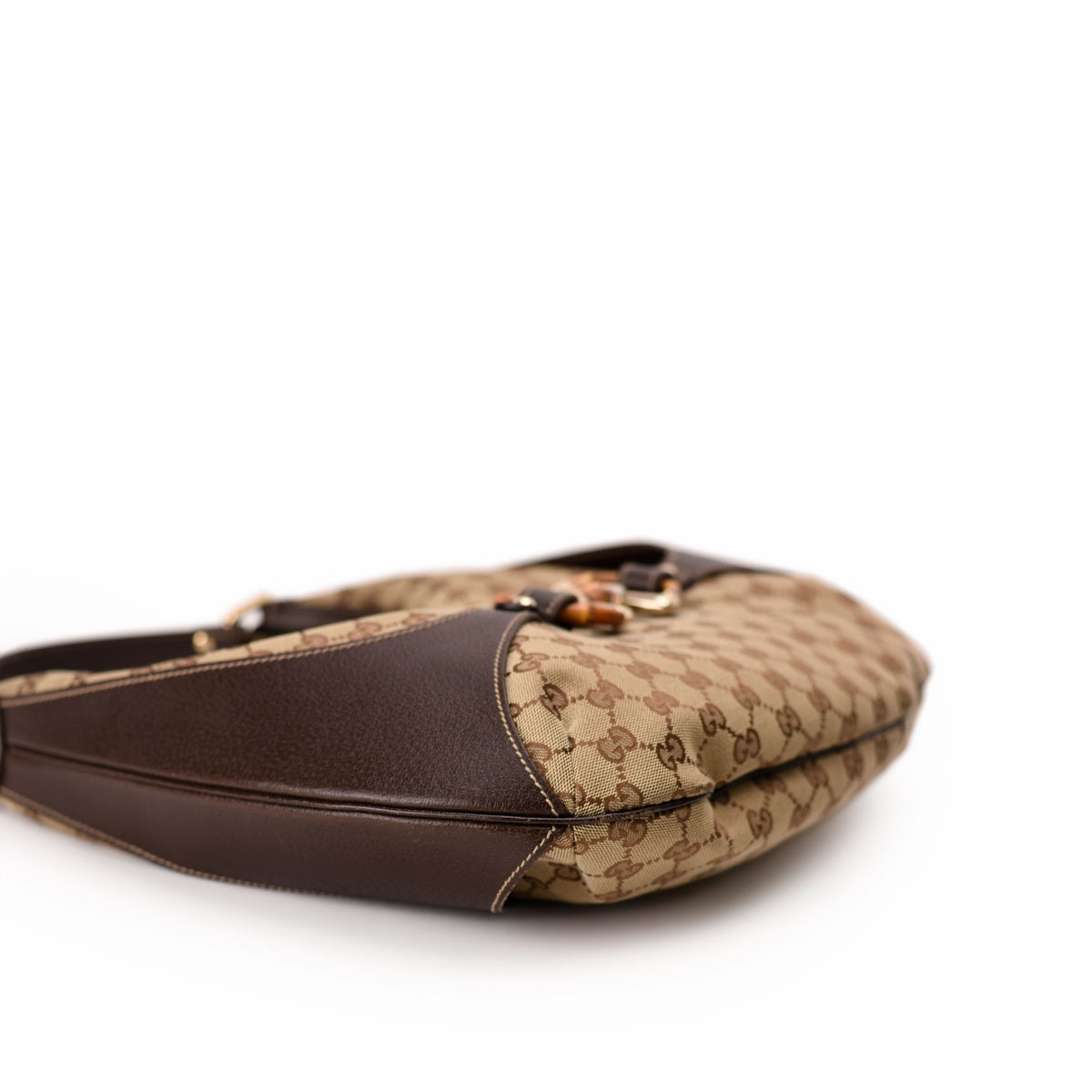 Gucci monogram canvas and brown leather shoulder bag. curated Pre-loved Luxury by Myluxe in Helsinki.