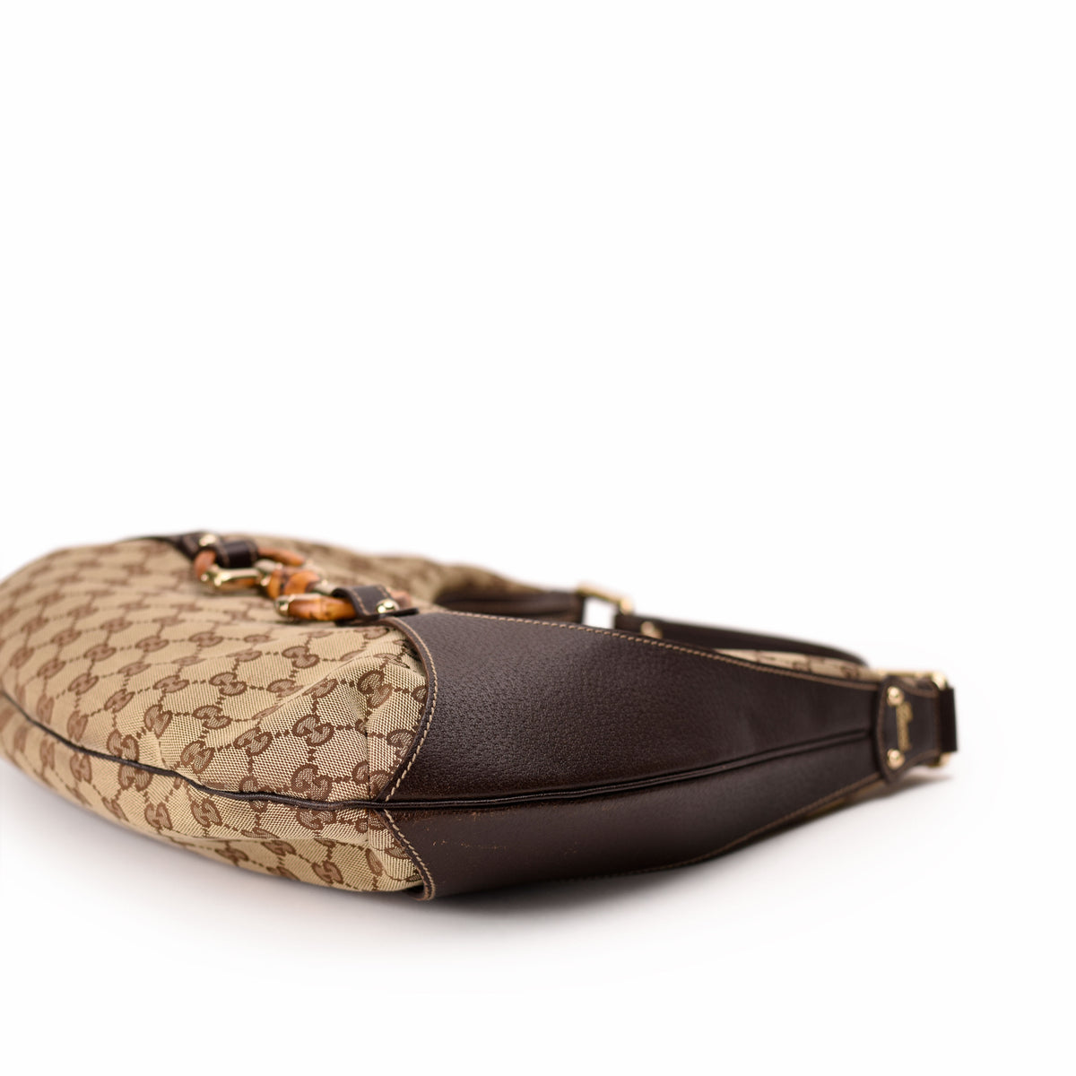 Gucci monogram canvas and brown leather shoulder bag. curated Pre-loved Luxury by Myluxe in Helsinki.