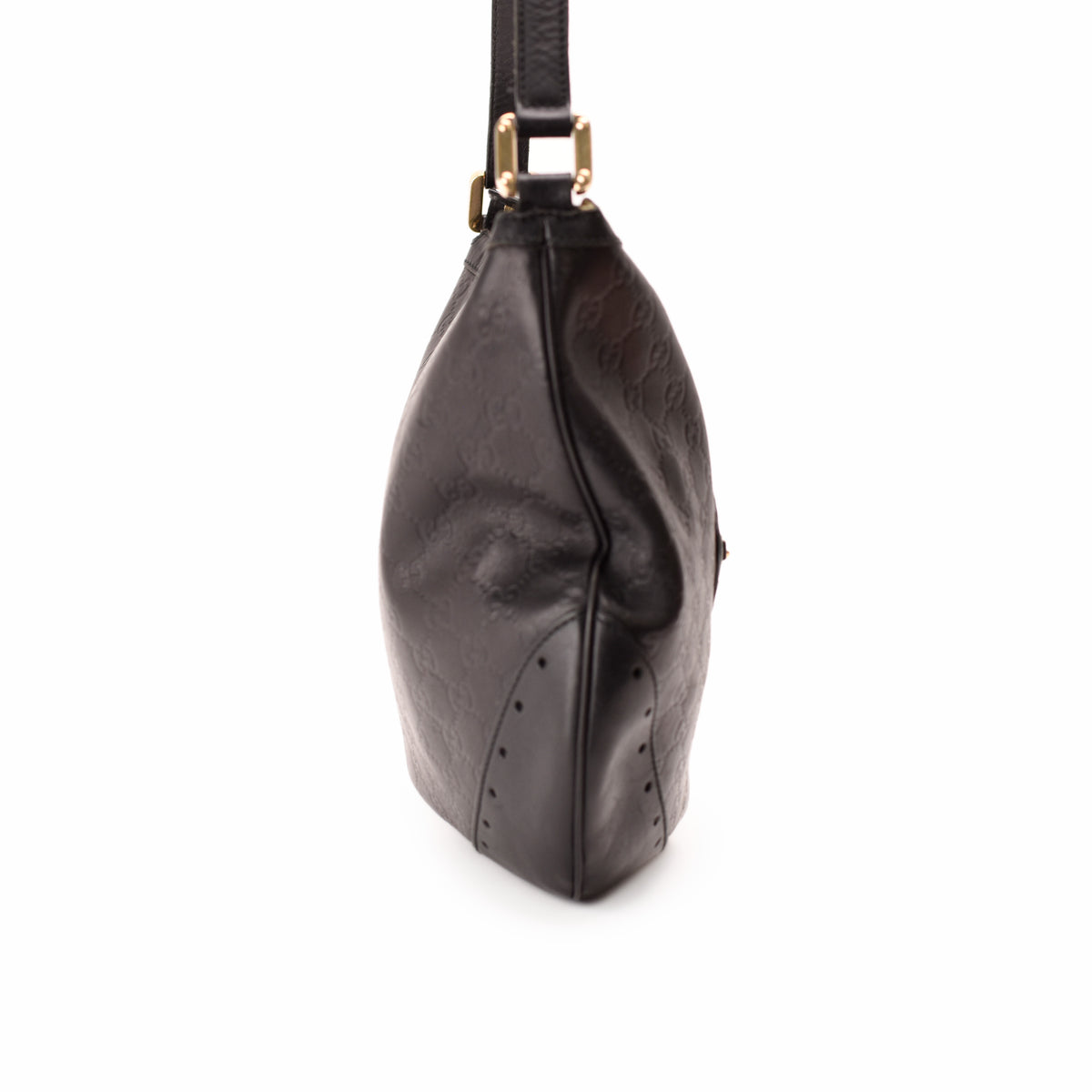 Black monogrammed leather shoulder bag with gold-tone hardware, curated Pre-loved Luxury by Myluxe in Helsinki.