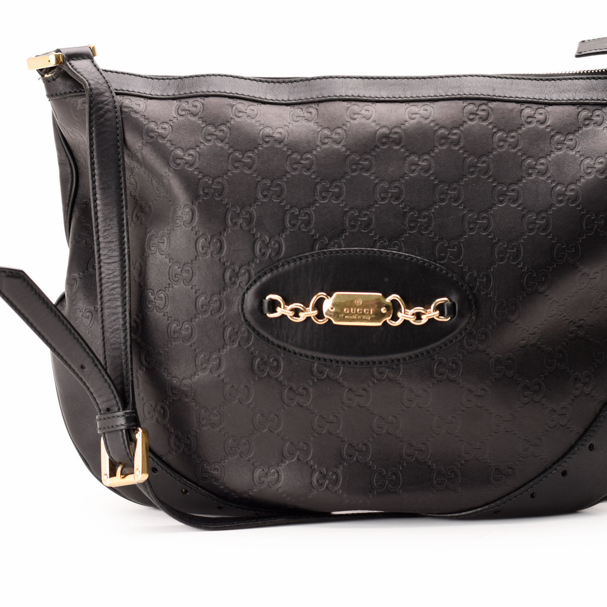 Black embossed leather Gucci hobo bag with gold-tone hardware, curated Pre-loved Luxury by Myluxe in Helsinki.