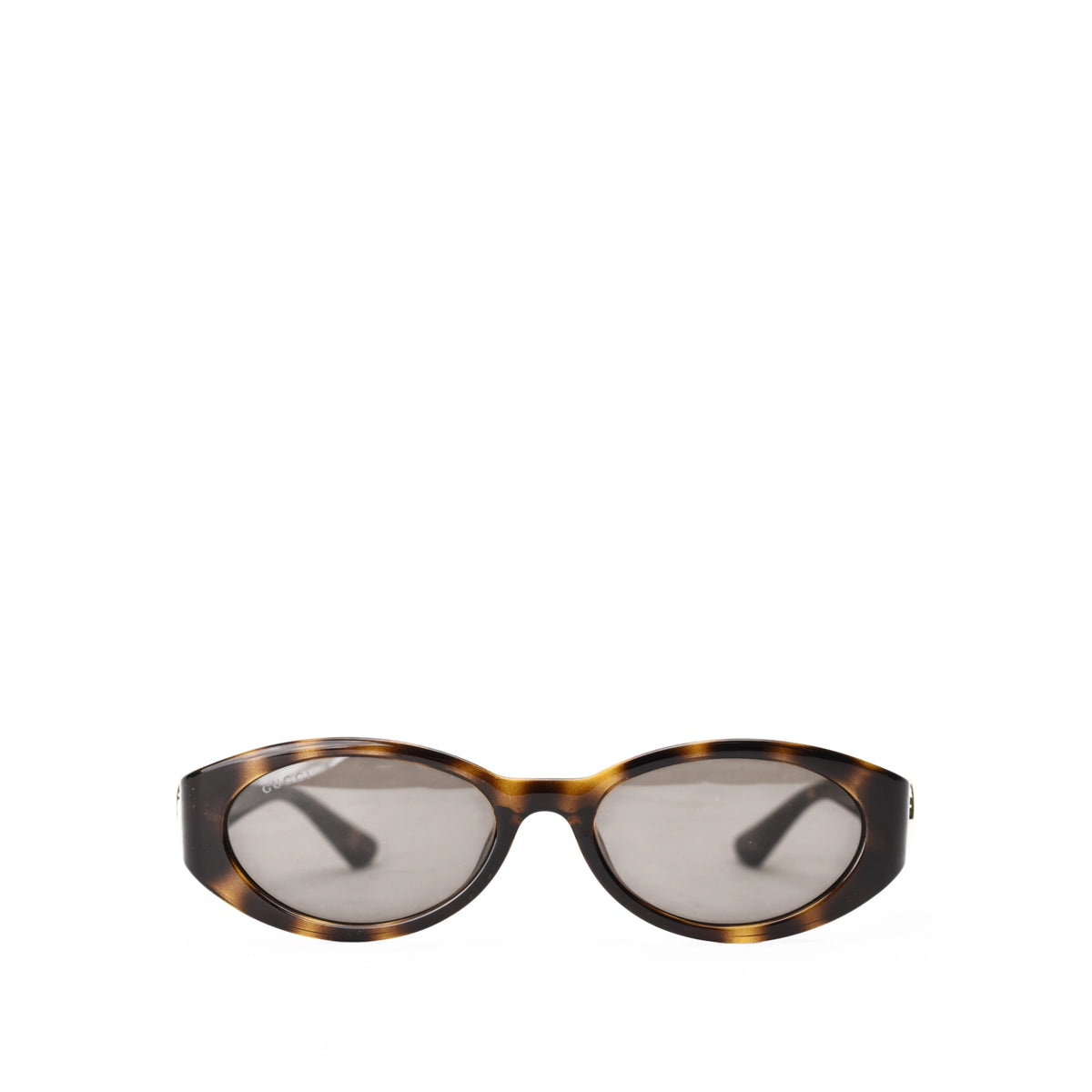 Gucci Havana Brown sunglasses with oval frames. curated Pre-loved Luxury by Myluxe in Helsinki.