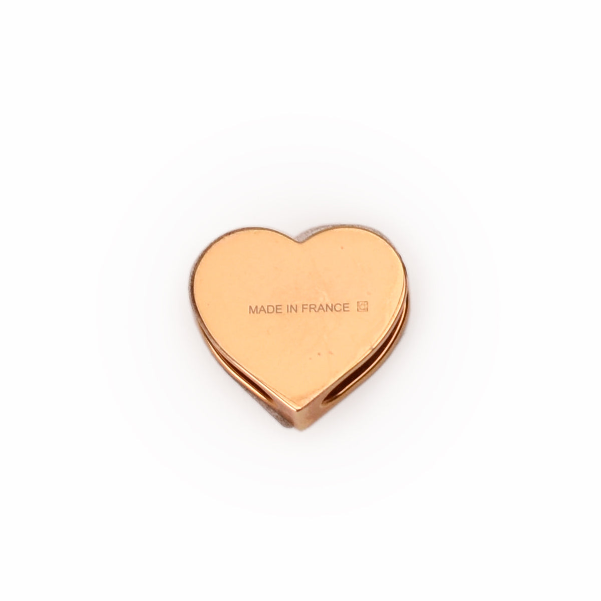 Gold-tone heart-shaped charm with Made in France engraving. curated Pre-loved Luxury by Myluxe in Helsinki.
