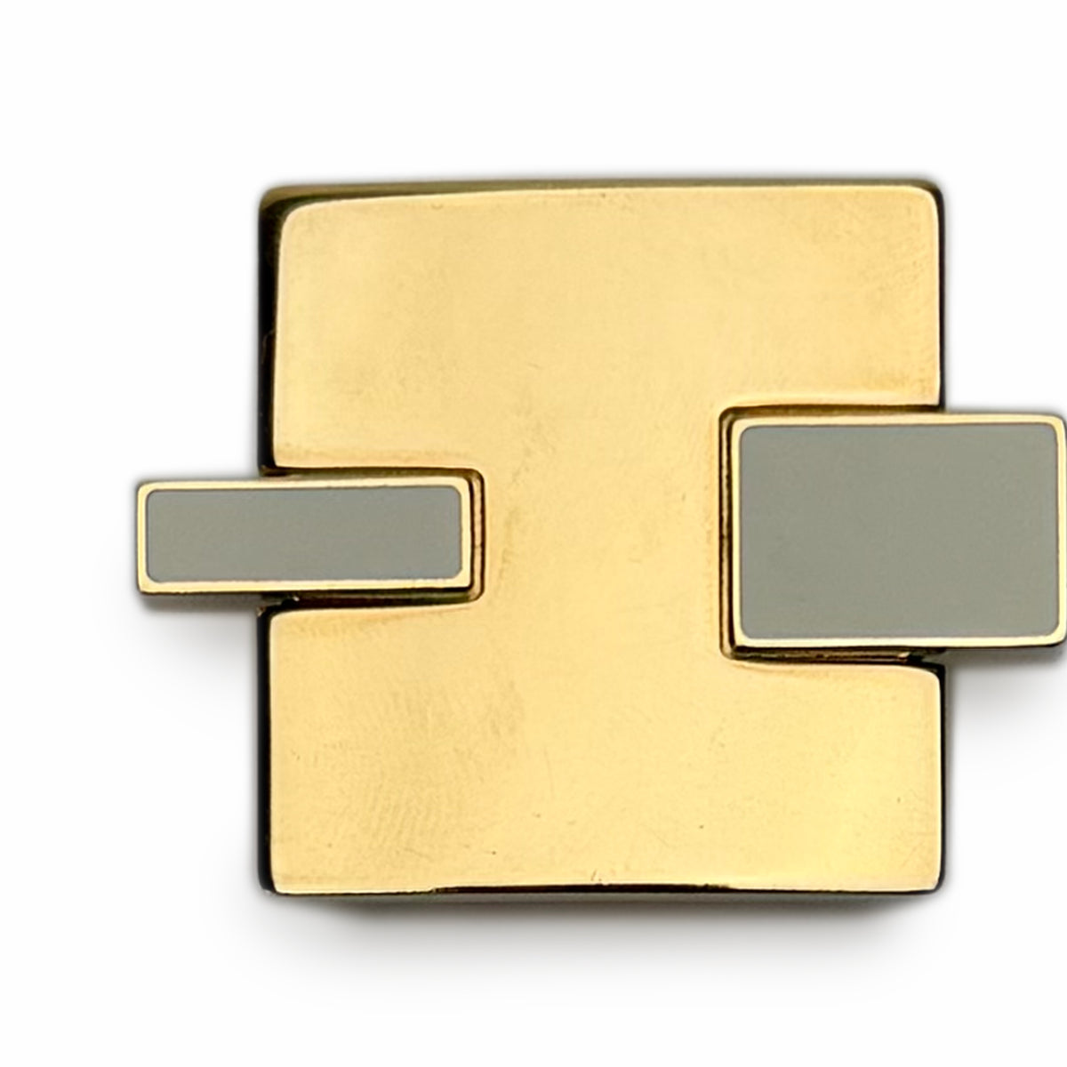 Gold and grey geometric designer cufflink, curated Pre-loved Luxury by Myluxe in Helsinki.