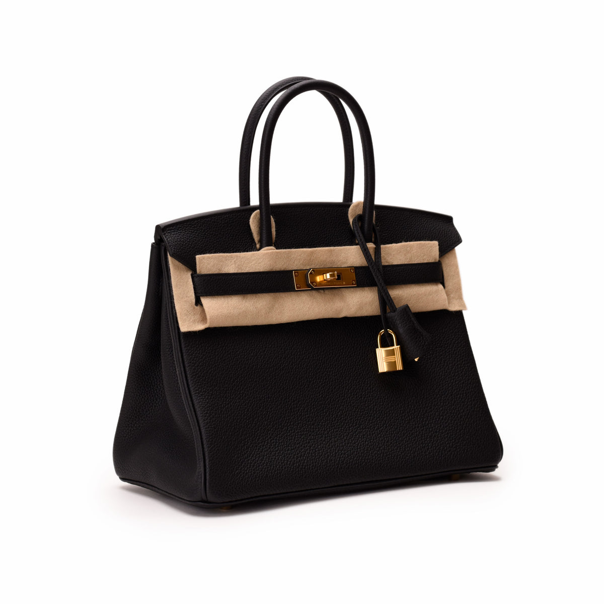 Black pebbled leather Hermès Birkin bag with gold-tone hardware, curated Pre-loved Luxury by Myluxe in Helsinki.