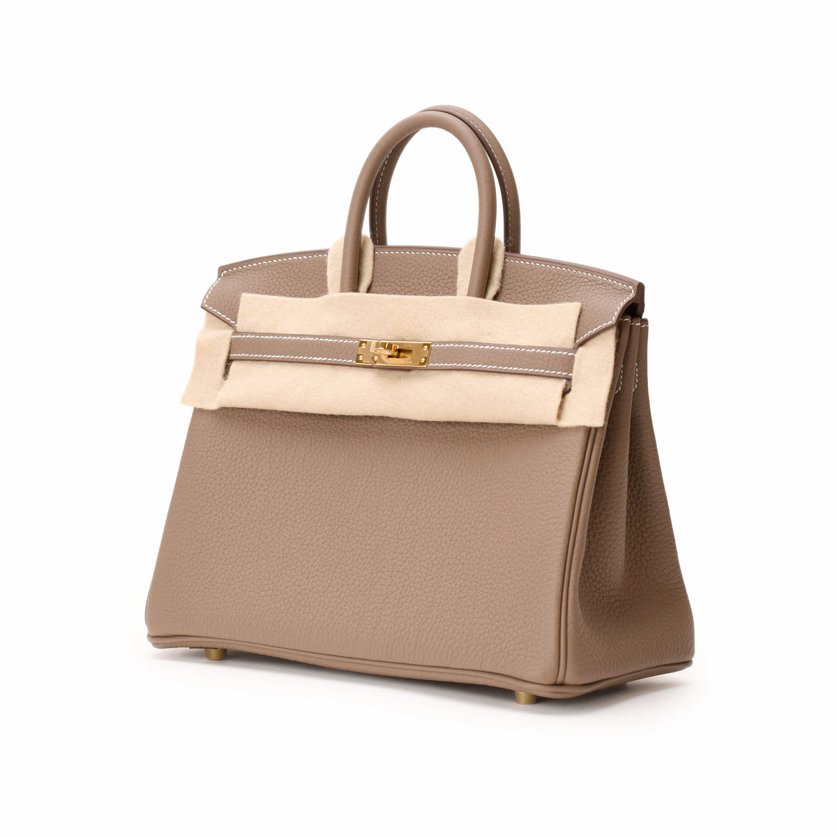 Hermès Togo leather top handle handbag in taupe color. curated Pre-loved Luxury by Myluxe in Helsinki.