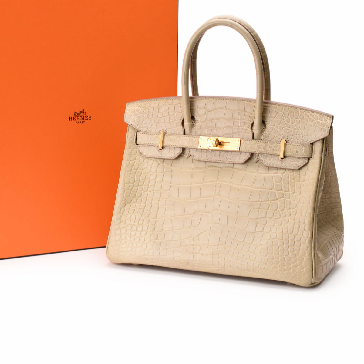 Hermès Birkin crocodile leather handbag in beige, curated Pre-loved Luxury by Myluxe in Helsinki.