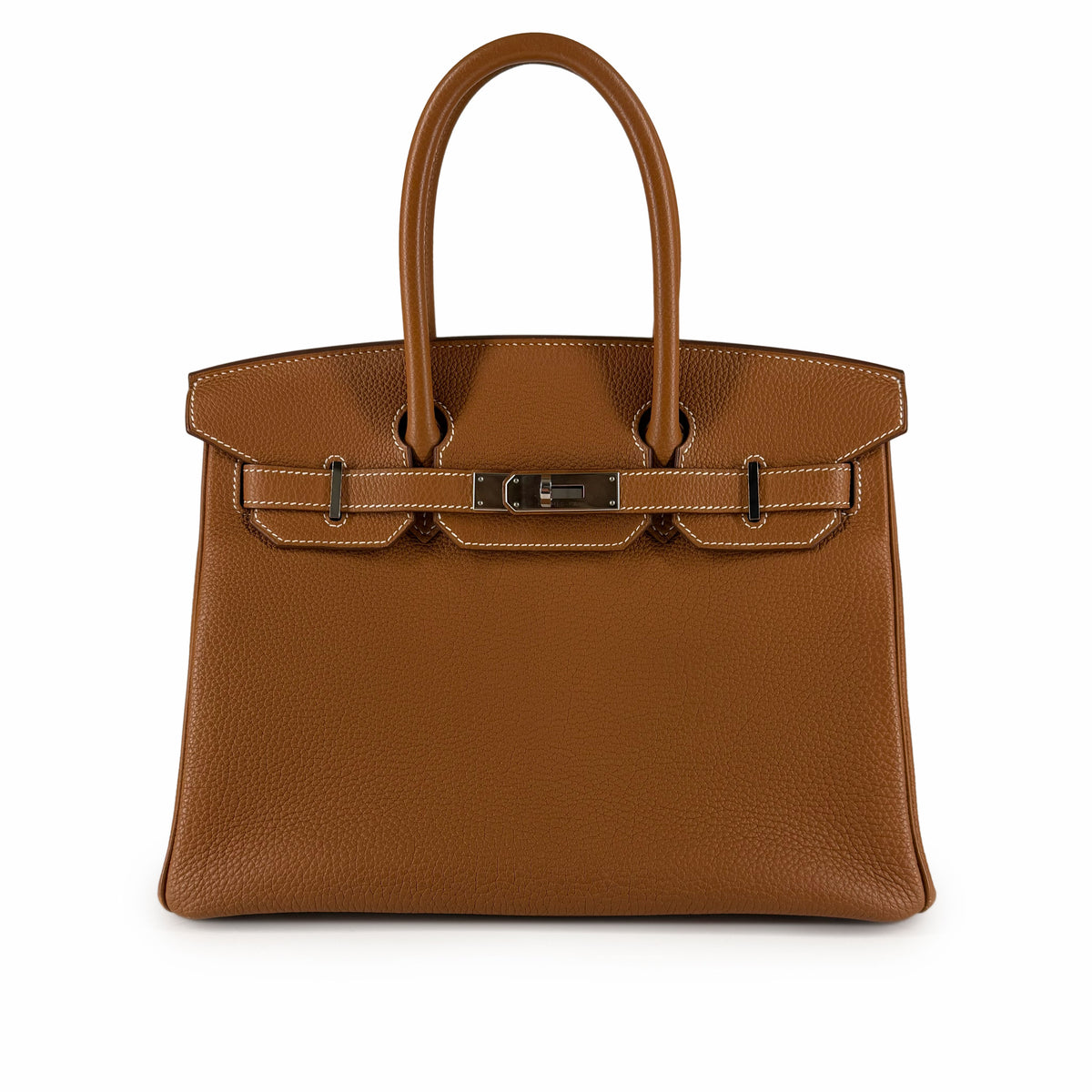 Tan pebbled leather luxury handbag with silver hardware, curated Pre-loved Luxury by Myluxe in Helsinki.