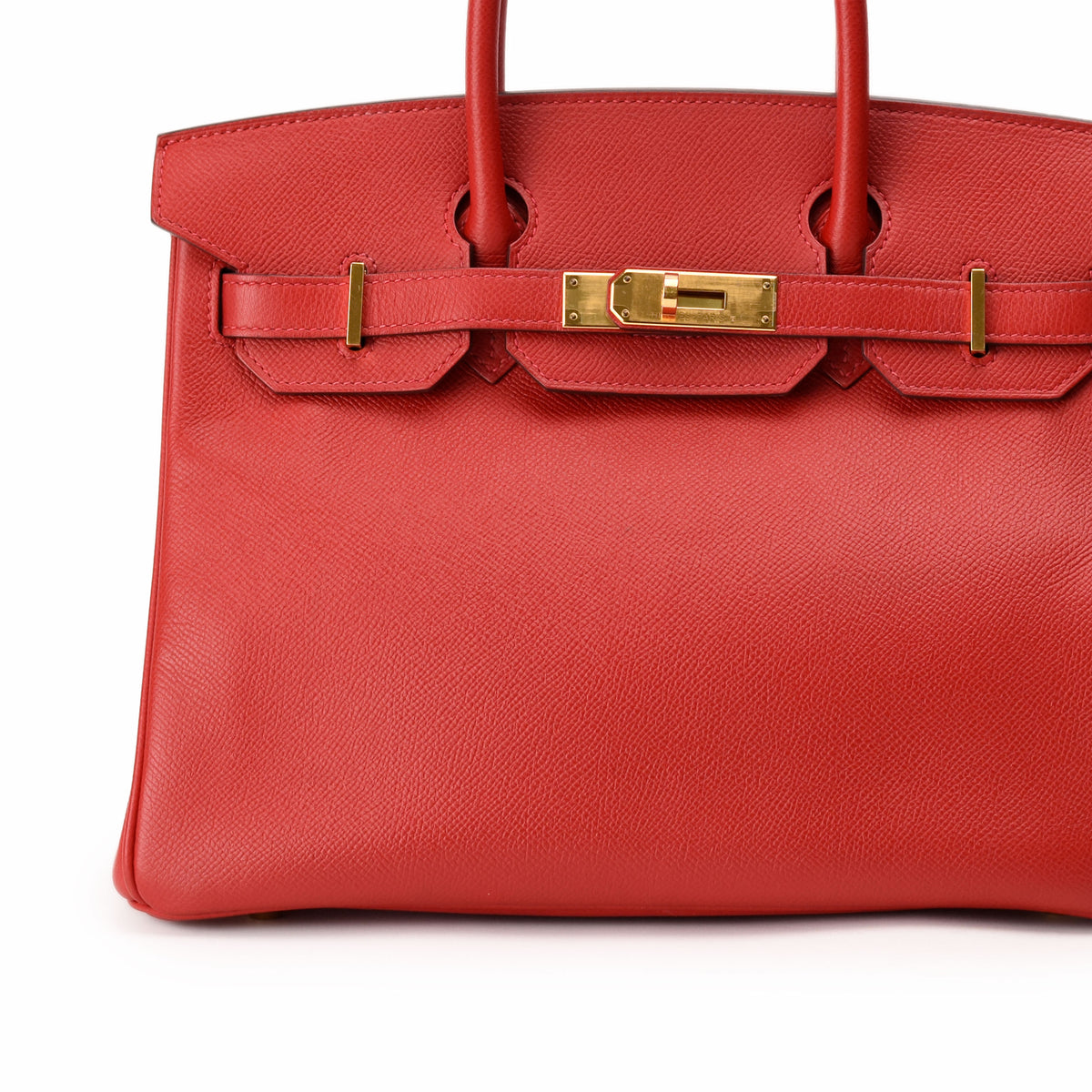 Red leather Hermès Birkin handbag with gold-tone hardware. curated Pre-loved Luxury by Myluxe in Helsinki.