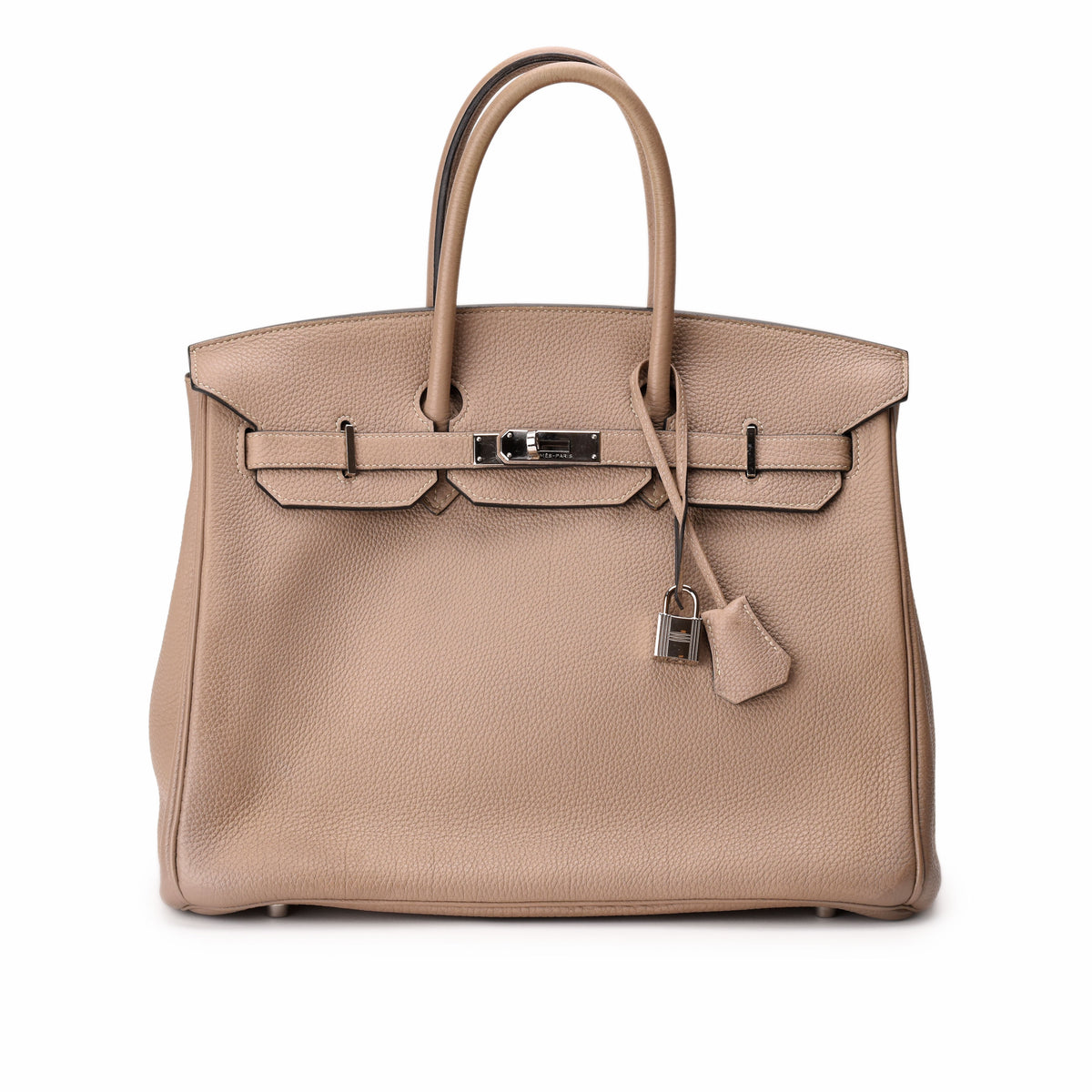 Hermès Birkin bag in taupe grained leather with silver hardware. curated Pre-loved Luxury by Myluxe in Helsinki.