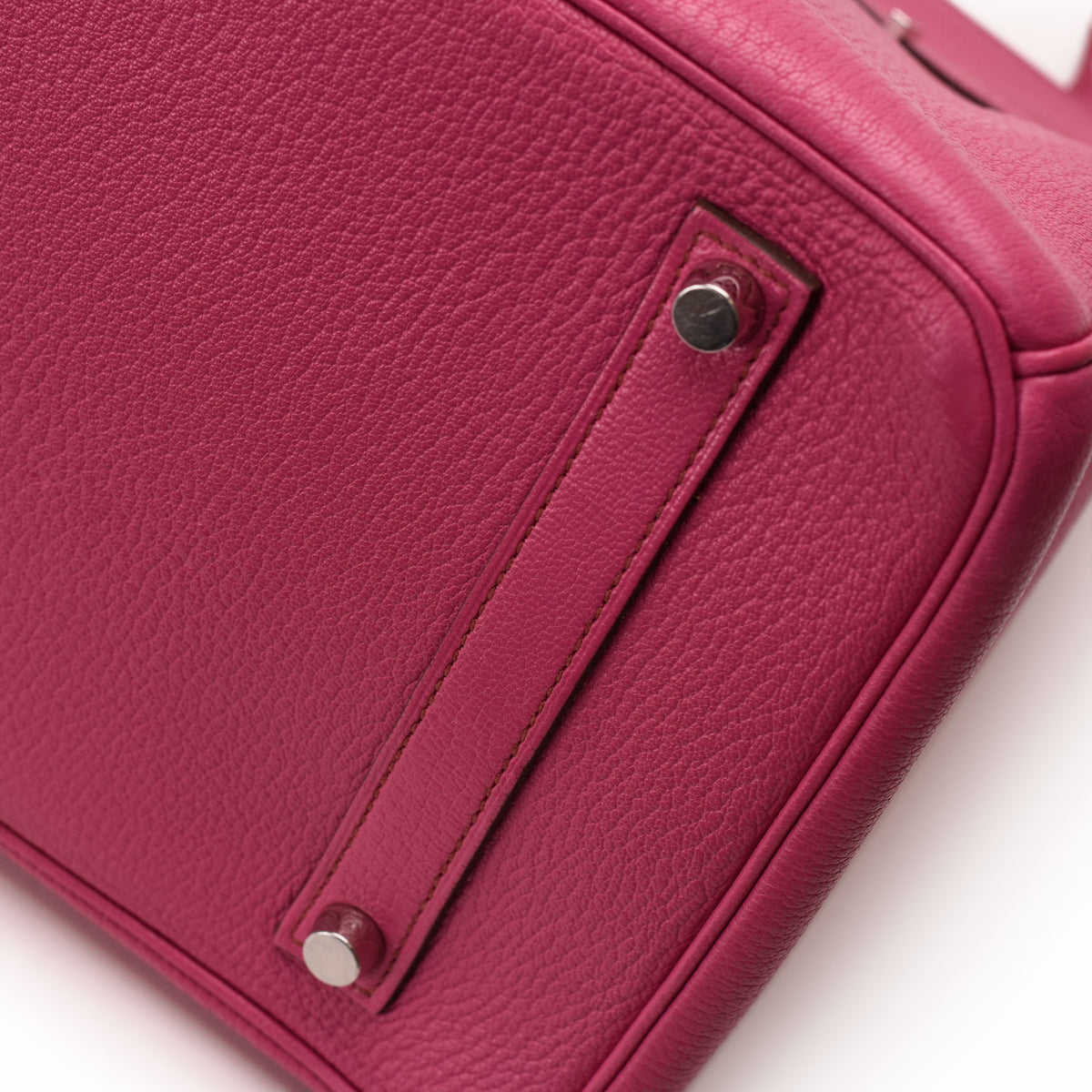 Hermès Birkin 35 Rose Pourpre Togo leather handbag with PHW, showcasing its luxurious design and elegant craftsmanship.