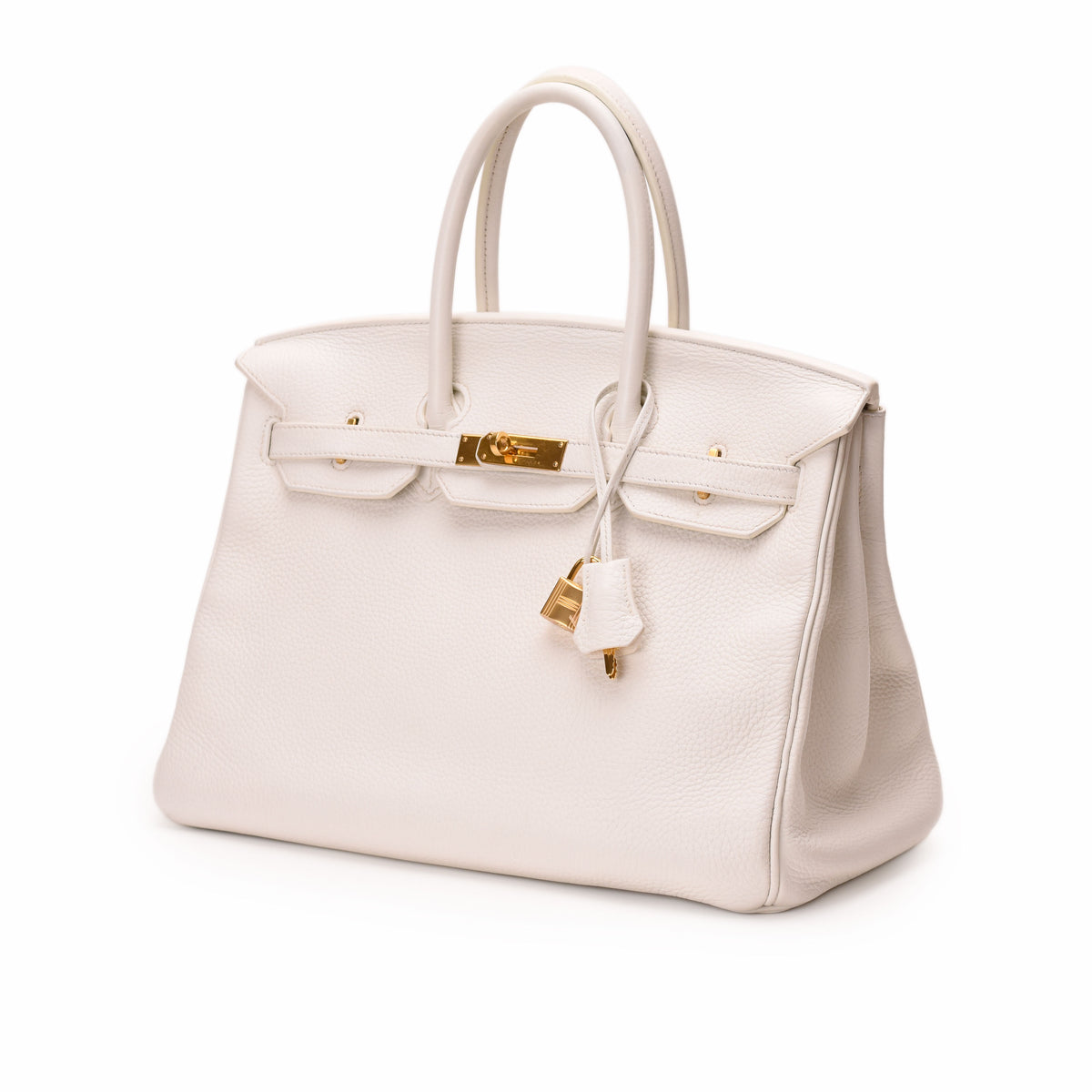 Hermès white leather Birkin handbag with gold-tone hardware. curated Pre-loved Luxury by Myluxe in Helsinki.