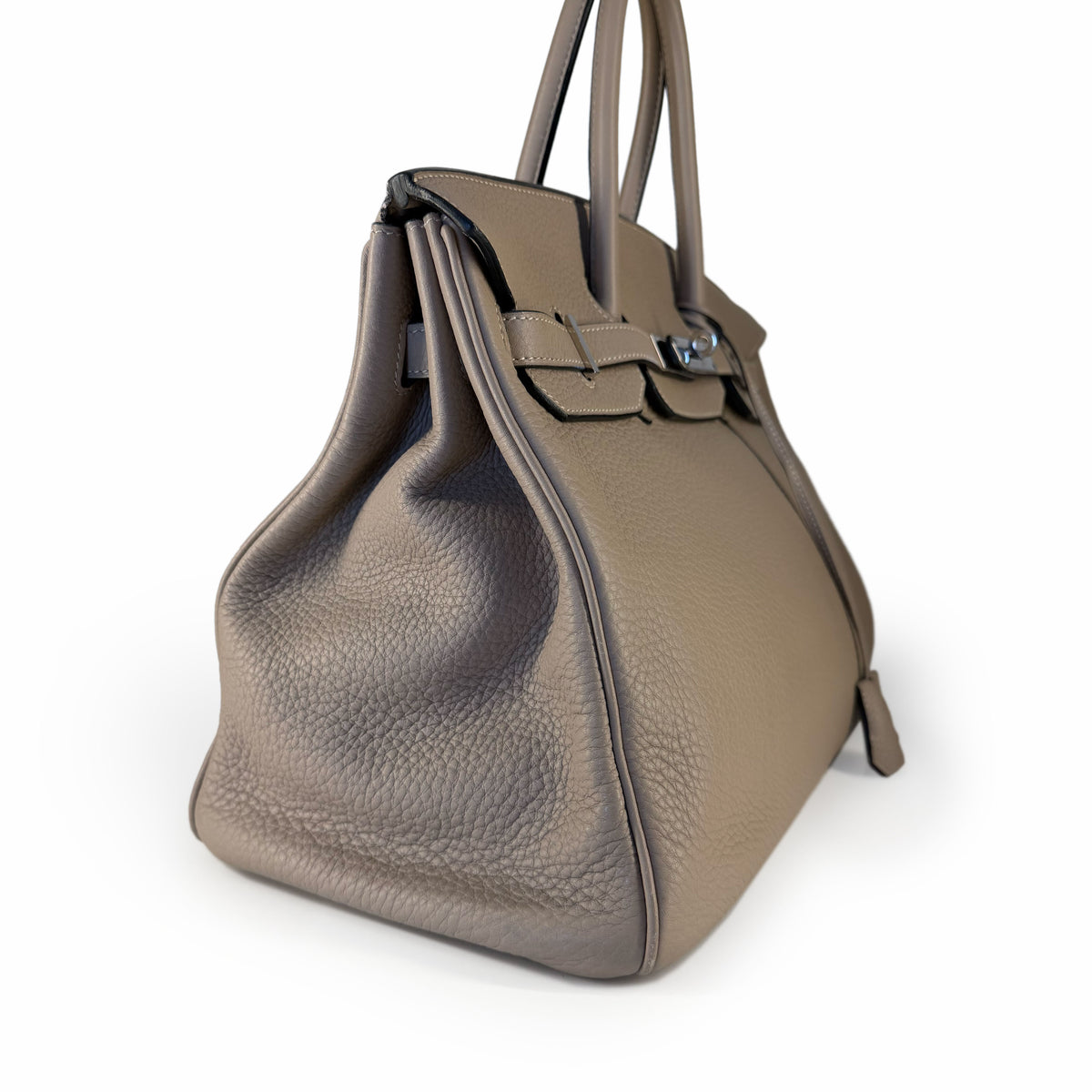 Taupe pebbled leather luxury handbag with top handles, curated Pre-loved Luxury by Myluxe in Helsinki.