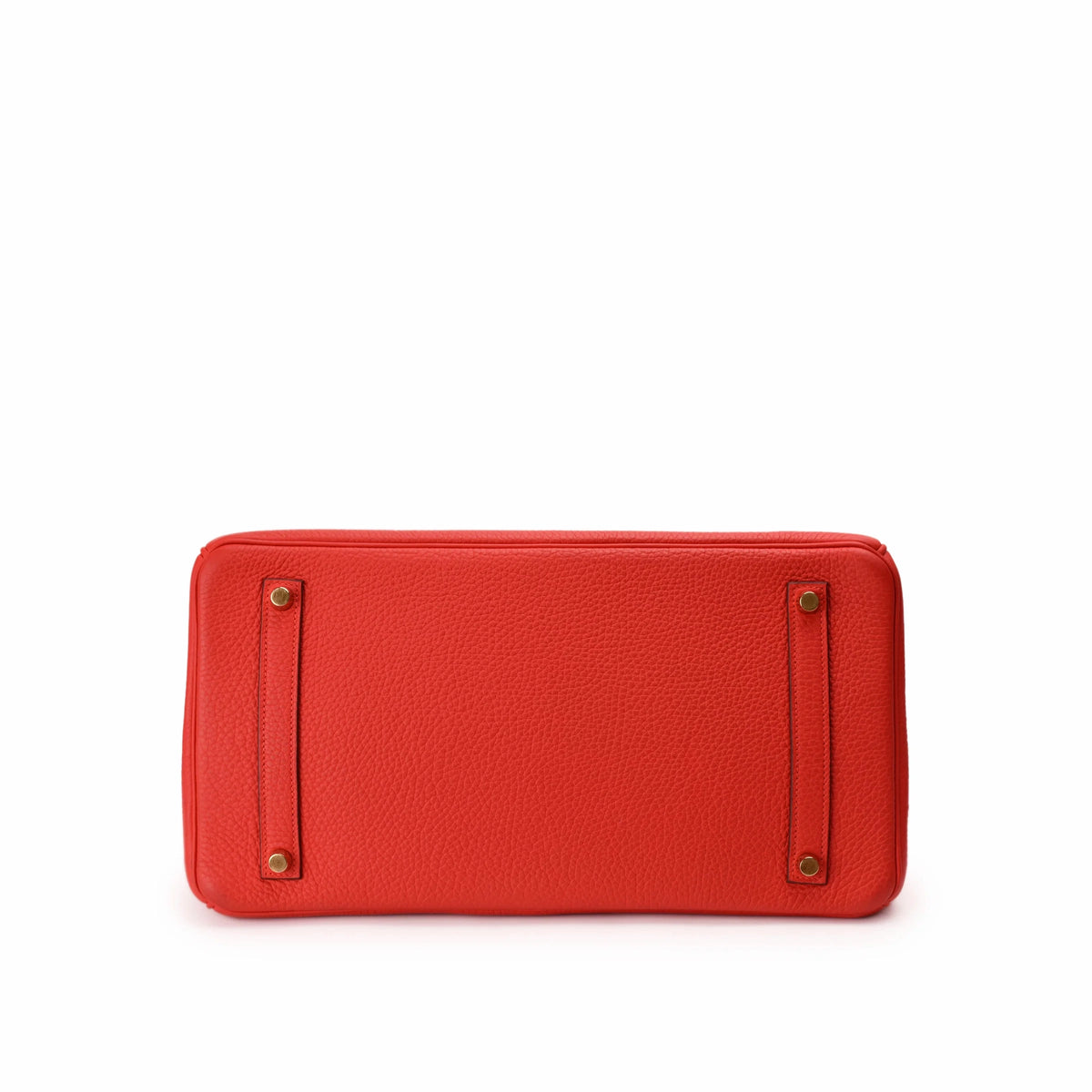 Red grained leather rectangular clutch bag with gold-tone hardware. curated Pre-loved Luxury by Myluxe in Helsinki.