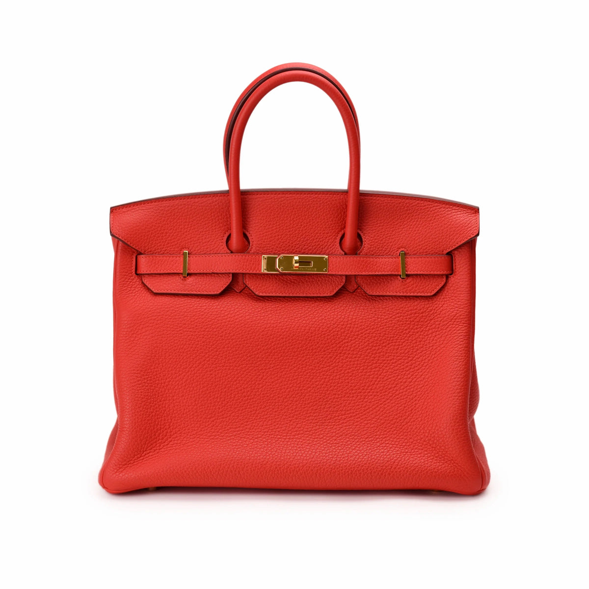 Red Hermès Togo leather handbag with gold hardware. curated Pre-loved Luxury by Myluxe in Helsinki.
