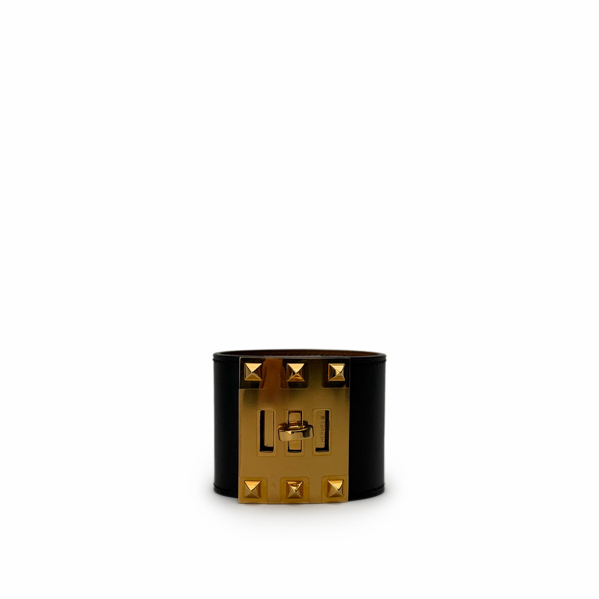 Black leather wide cuff bracelet with gold-tone pyramid studs, curated Pre-loved Luxury by Myluxe in Helsinki.
