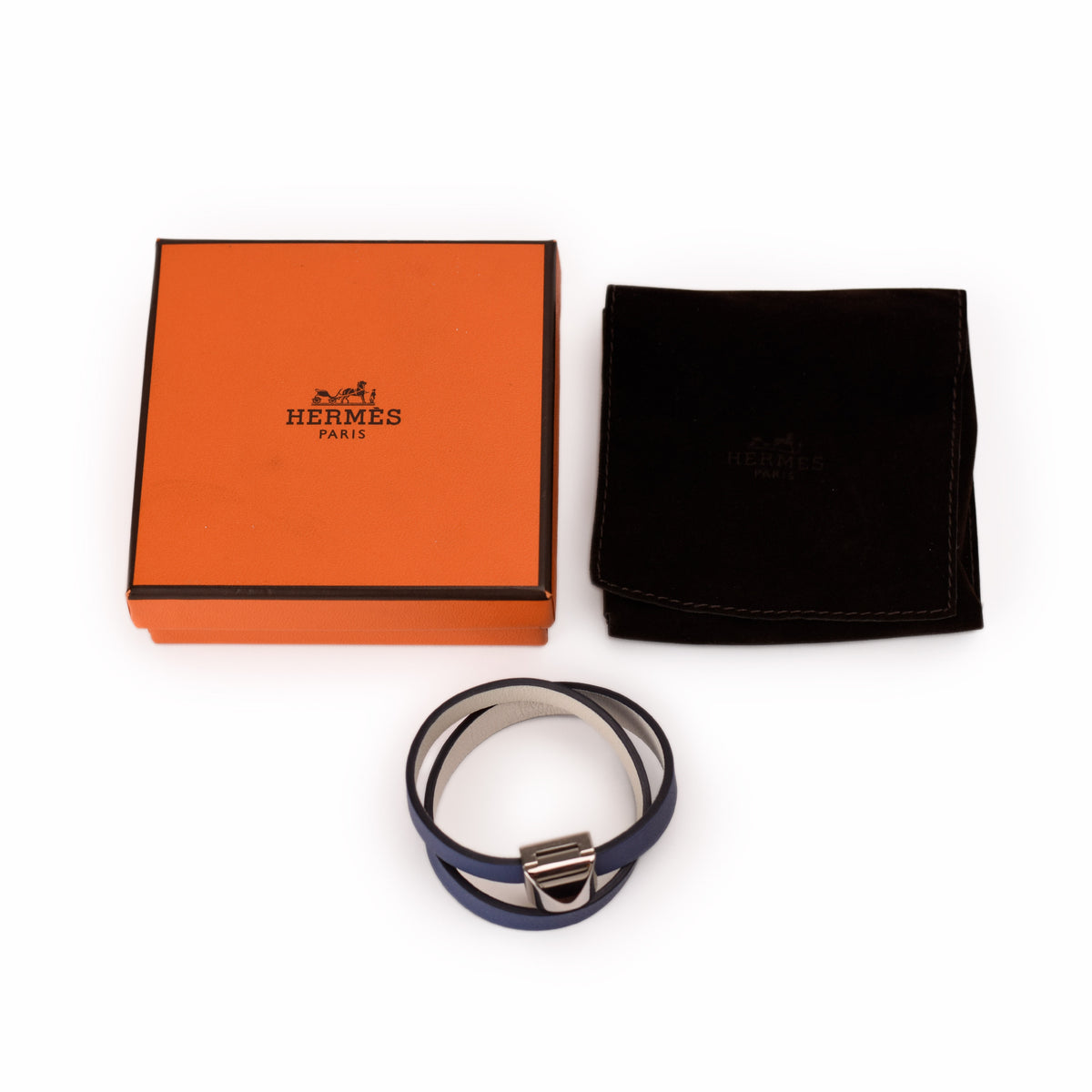 Hermès blue leather wrap bracelet with silver clasp. curated Pre-loved Luxury by Myluxe in Helsinki.