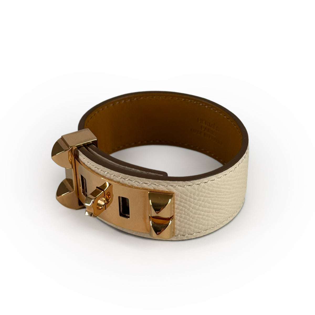 Cream Epsom leather bracelet with gold-tone hardware, curated Pre-loved Luxury by Myluxe in Helsinki.
