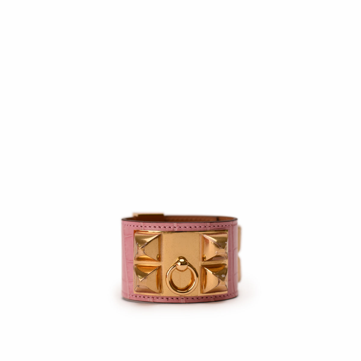 Pink crocodile-embossed leather bracelet with gold-tone pyramid studs. curated Pre-loved Luxury by Myluxe in Helsinki.