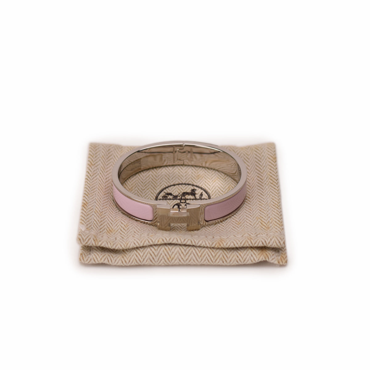 Silver and pink enamel Cartier bangle bracelet. curated Pre-loved Luxury by Myluxe in Helsinki.
