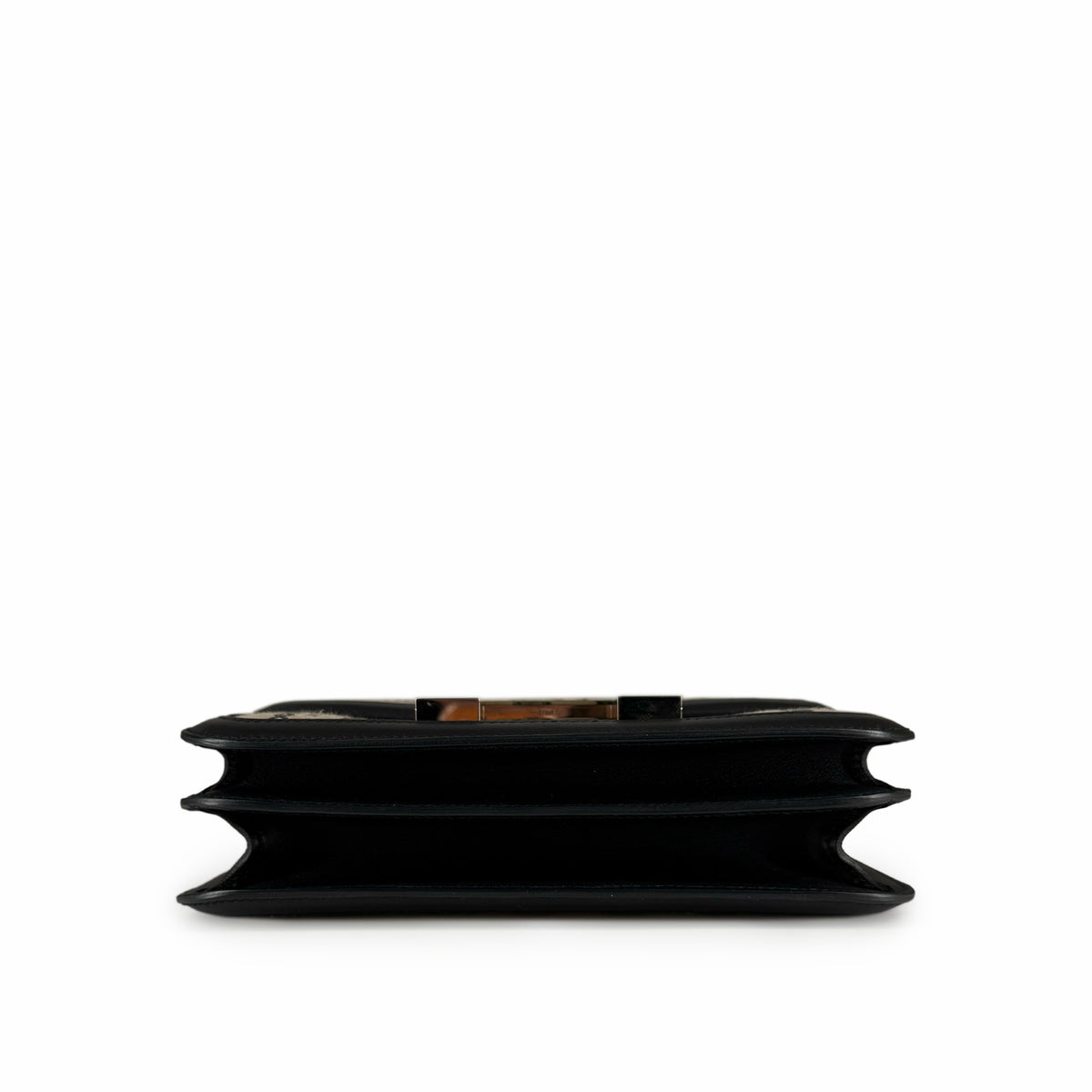 Black leather designer clutch with tortoiseshell hardware, curated Pre-loved Luxury by Myluxe in Helsinki.