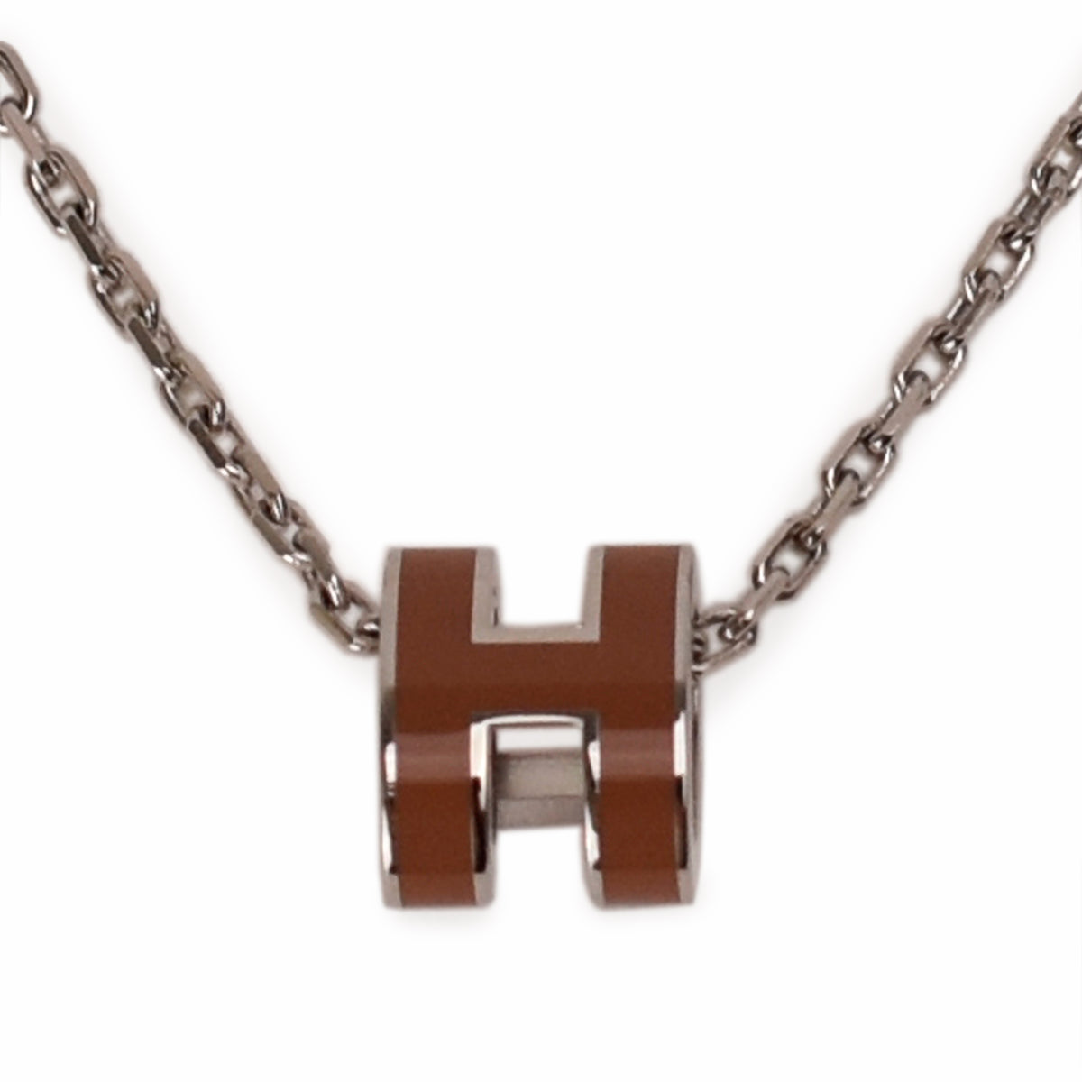 Hermès brown leather and silver-tone H pendant necklace, curated Pre-loved Luxury by Myluxe in Helsinki.
