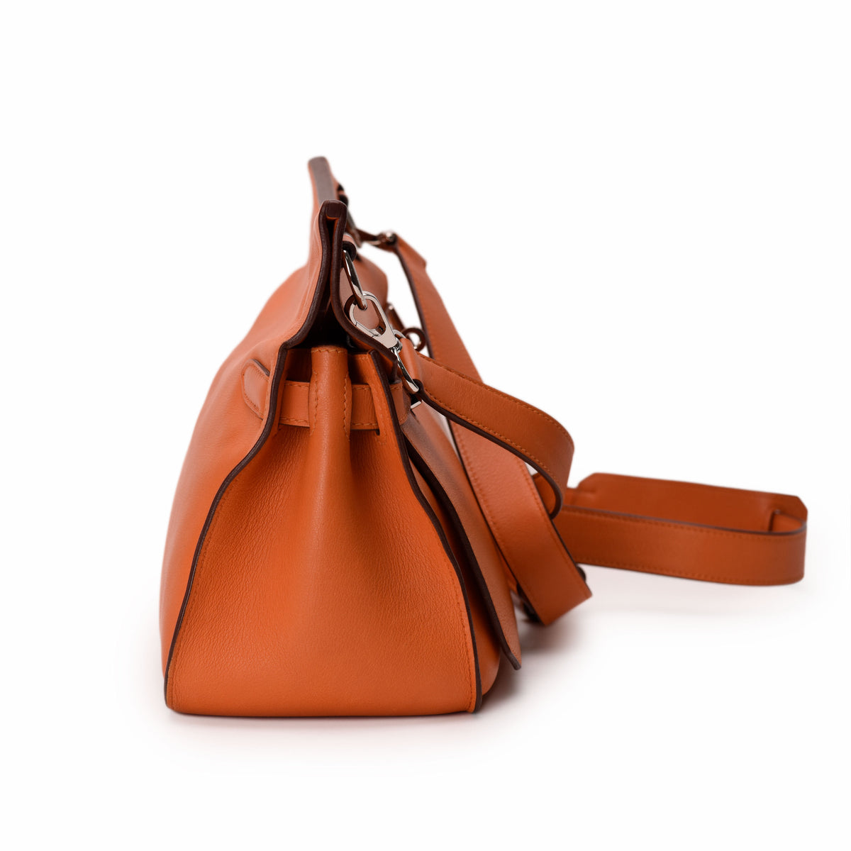 Orange leather Hermès handbag with adjustable shoulder strap, curated Pre-loved Luxury by Myluxe in Helsinki.