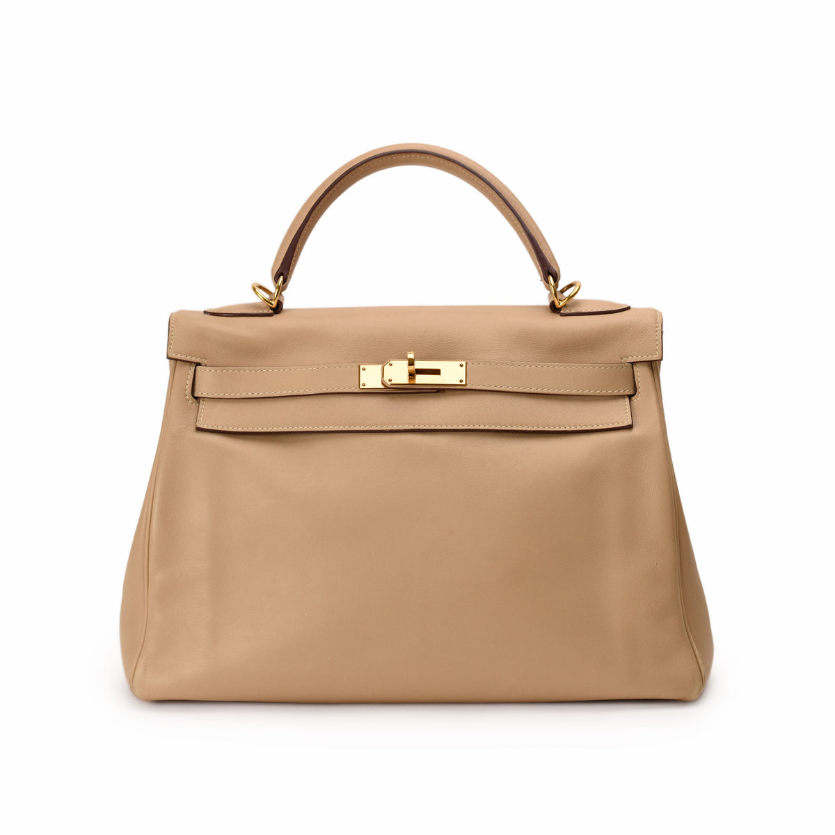 Beige leather Hermès handbag with gold hardware, curated Pre-loved Luxury by Myluxe in Helsinki.