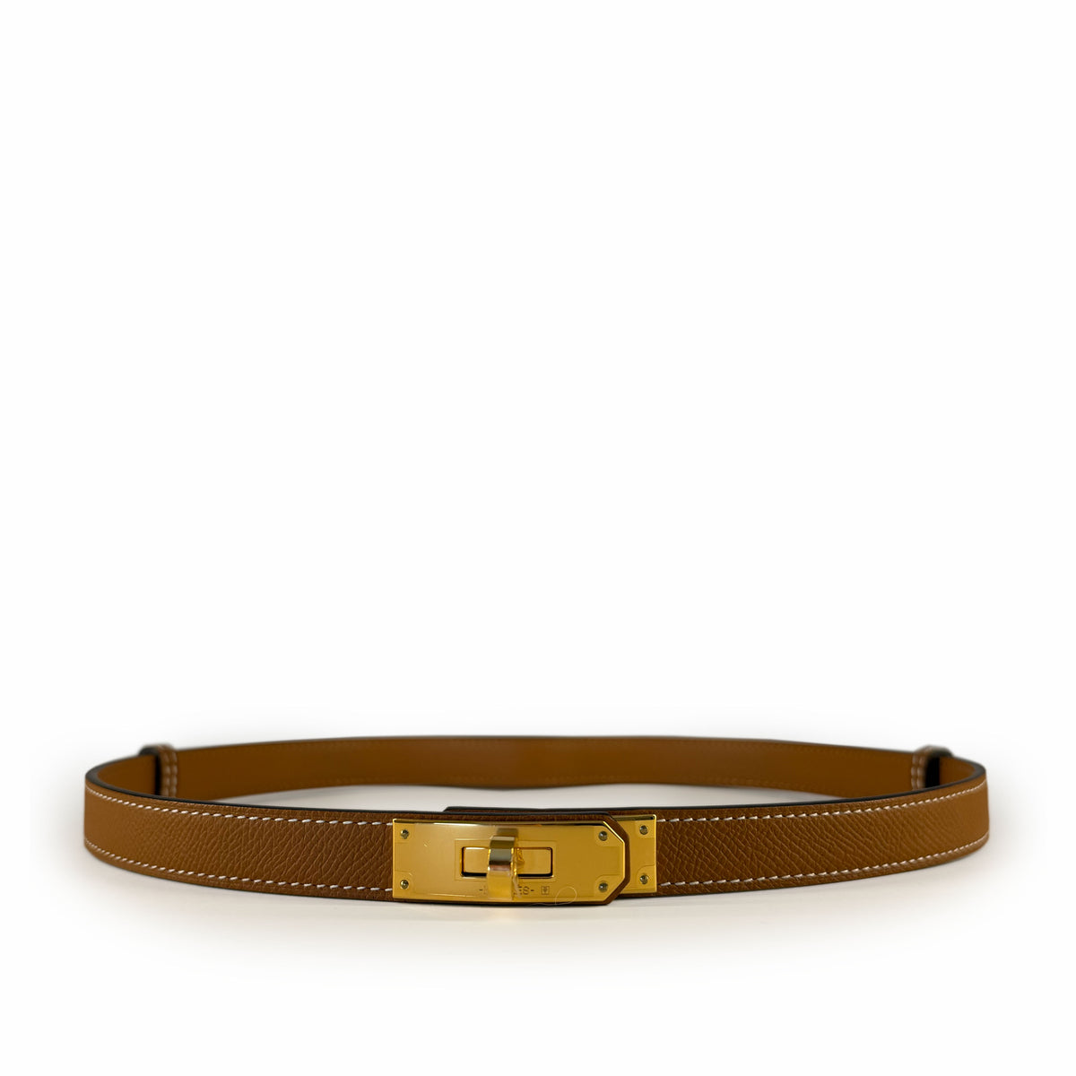 Tan leather belt with a polished gold-tone buckle, curated Pre-loved Luxury by Myluxe in Helsinki.